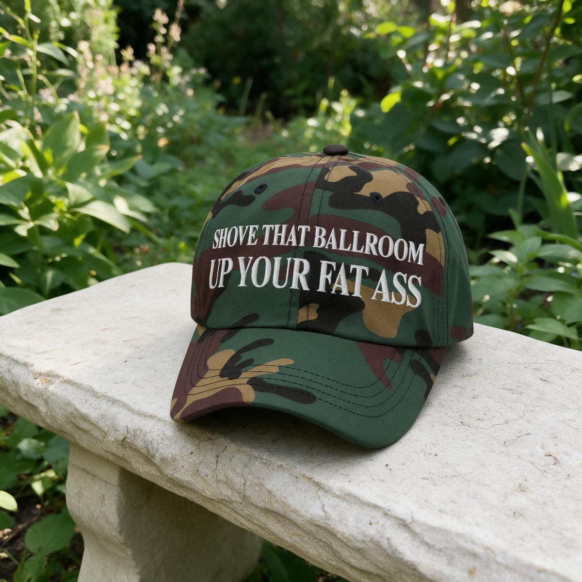 Shove That Ballroom Up Your Fat Ass embroidered hat in Green Camo resting on a flat surface, lifestyle image 2