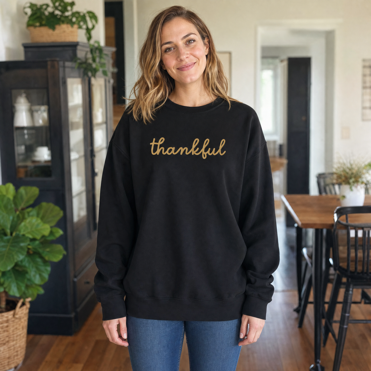 Model wearing the Thankful Script Sweatshirt sweatshirt in Black, cover image 1