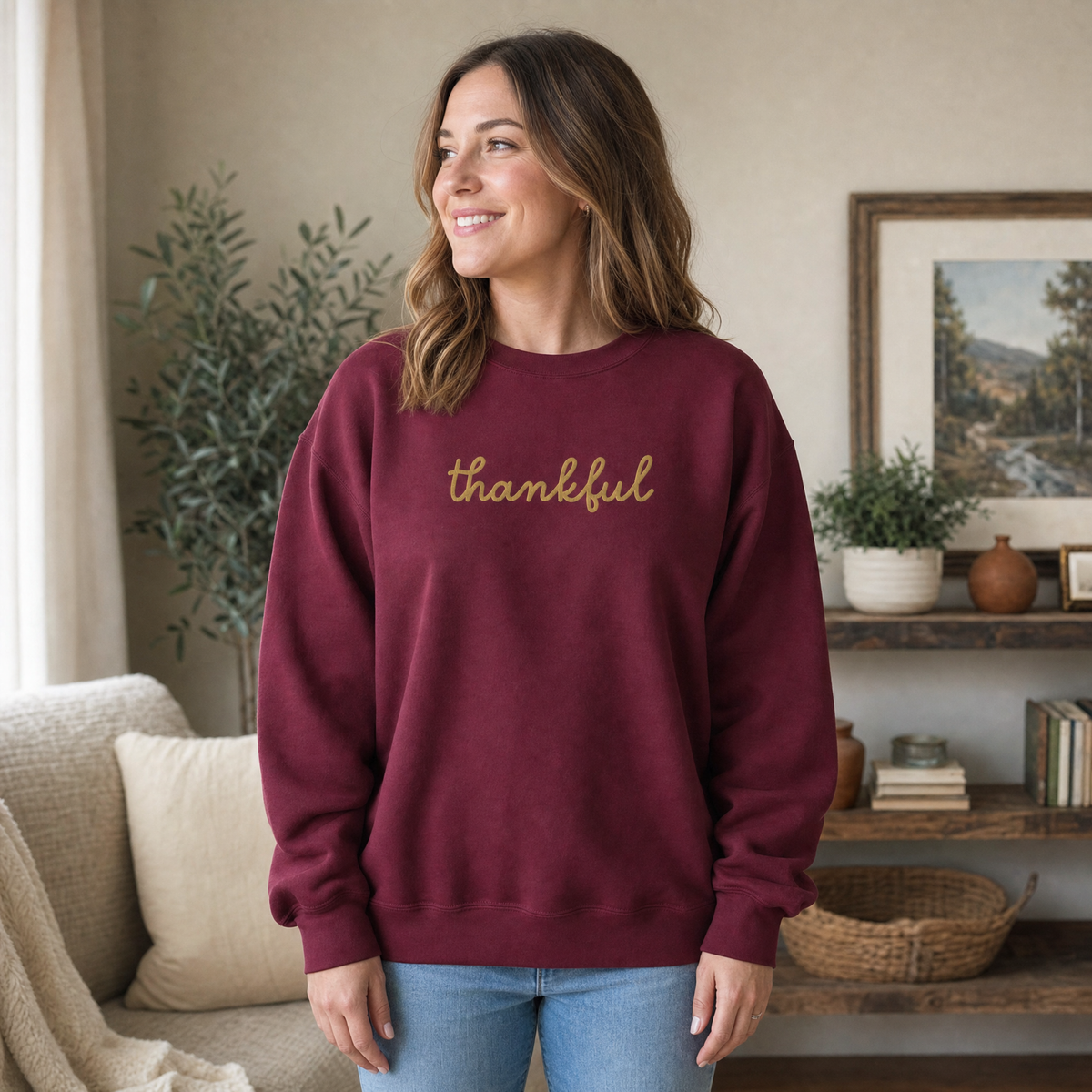 Model wearing the Thankful Script Sweatshirt sweatshirt in Maroon, lifestyle image 1