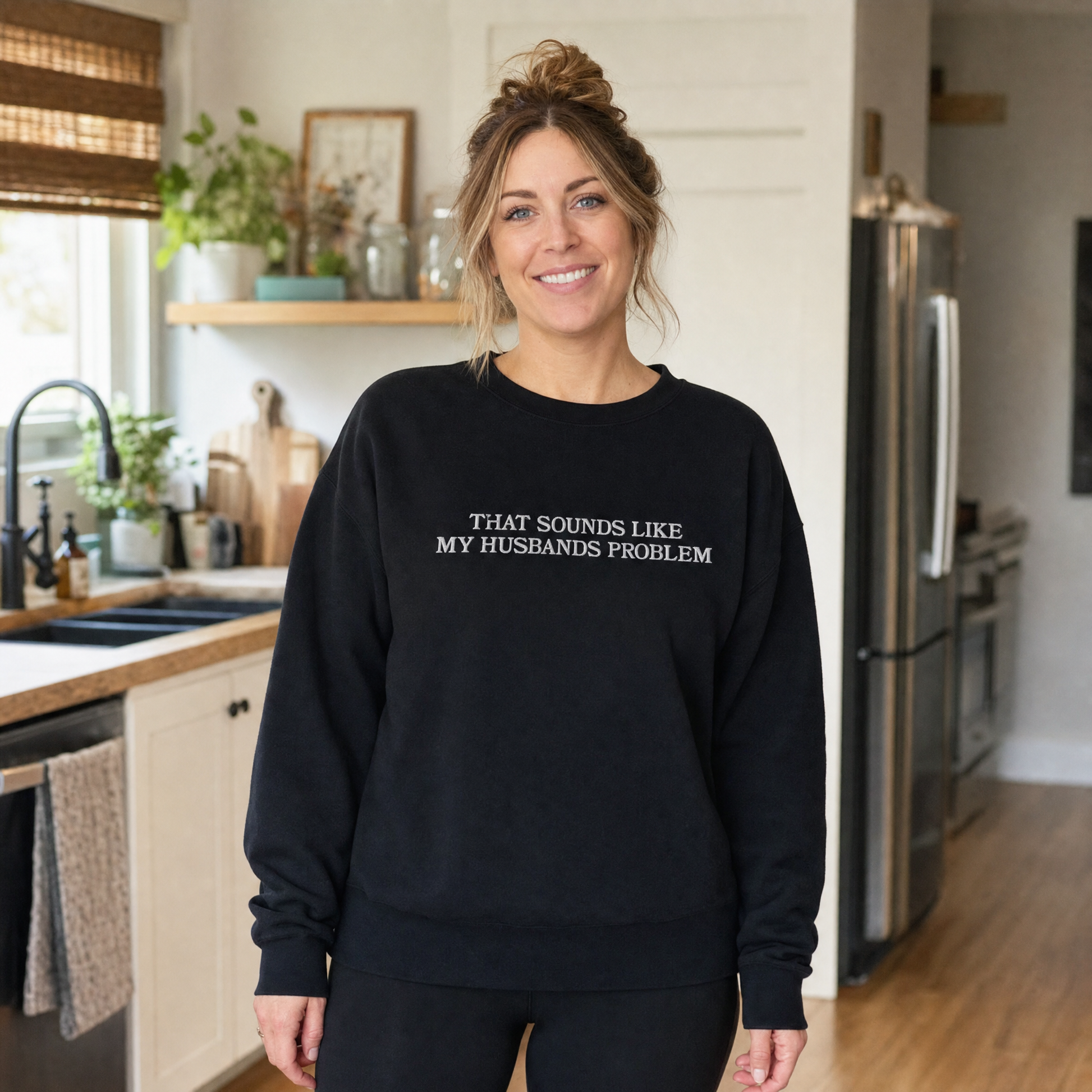 Model wearing the That Sounds Like My Husbands Problem sweatshirt in Black, lifestyle image 1