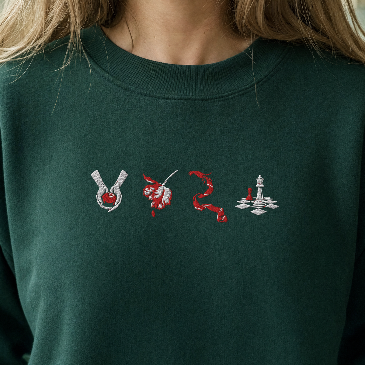 Model wearing the Twilight Saga Book Covers sweatshirt in Forest Green, lifestyle image 2