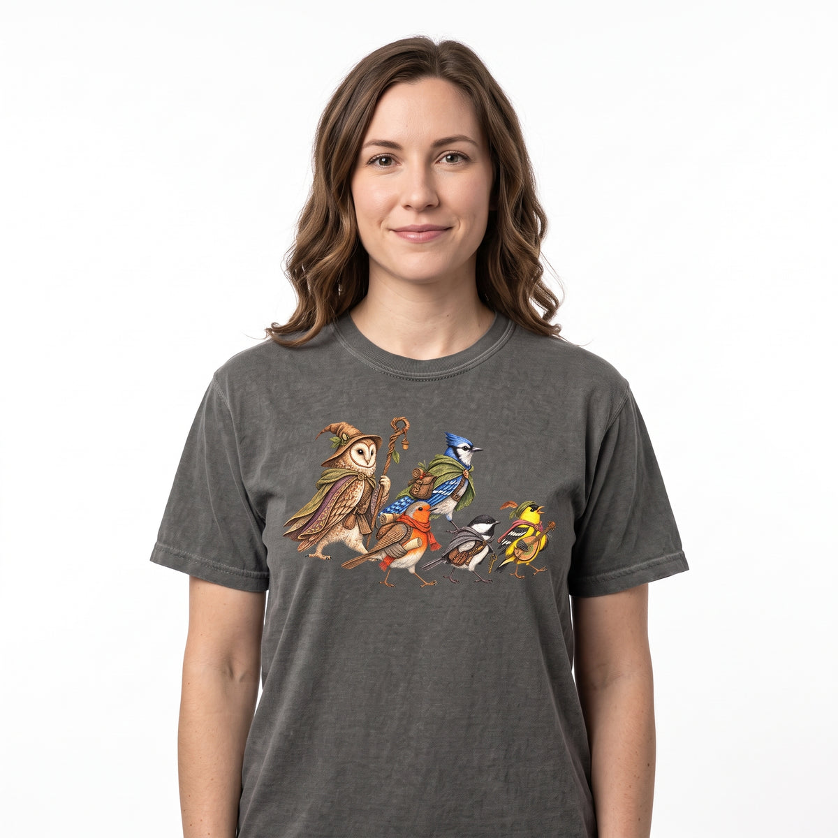 Model wearing the Fantasy Bird Adventurers comfort colors tee in Pepper, cover image 1