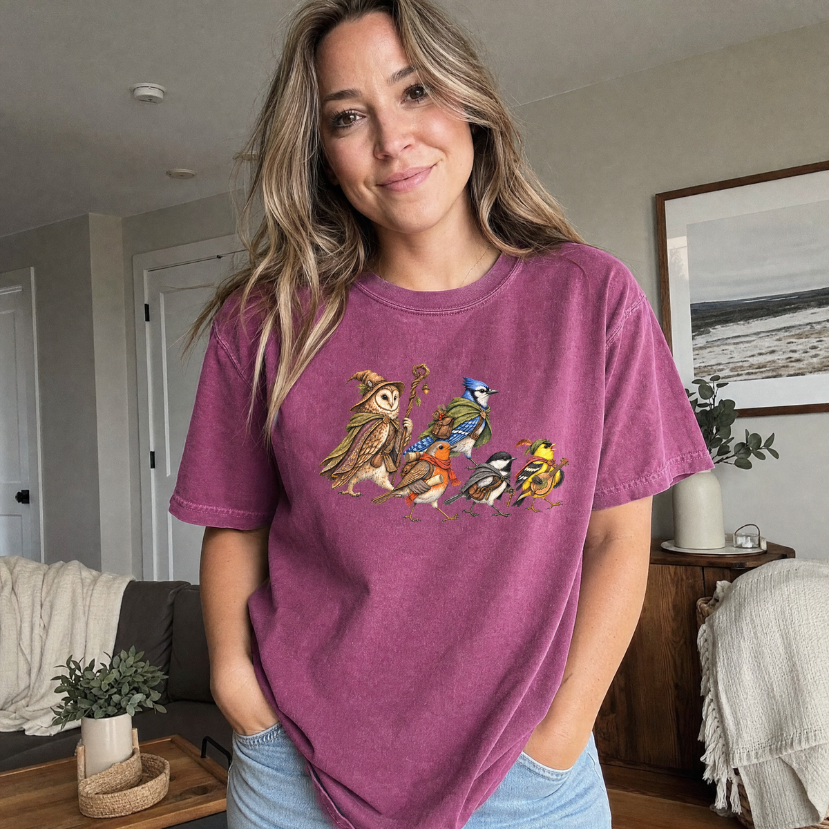 Model wearing the Fantasy Bird Adventurers comfort colors tee in Berry