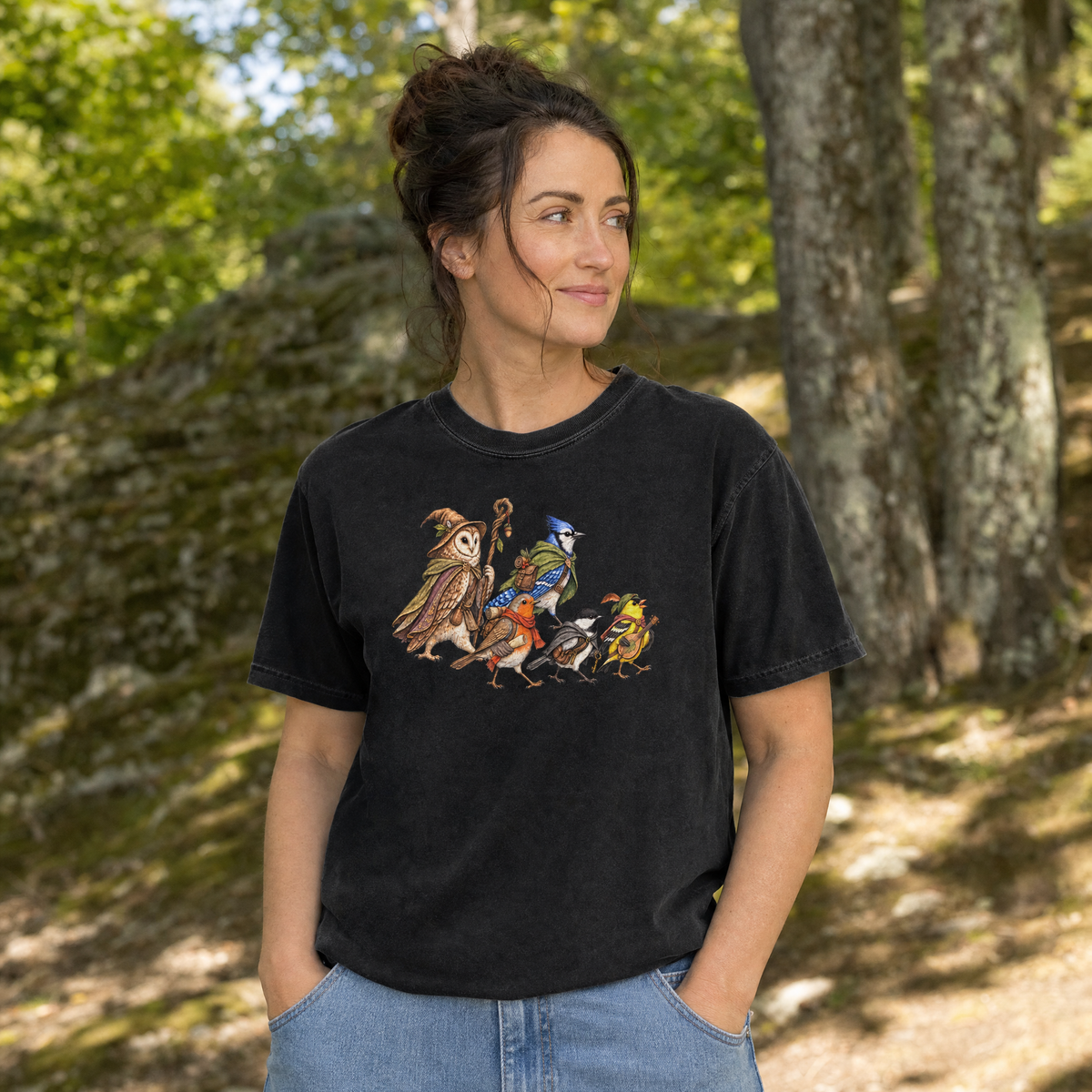 Model wearing the Fantasy Bird Adventurers comfort colors tee in Black