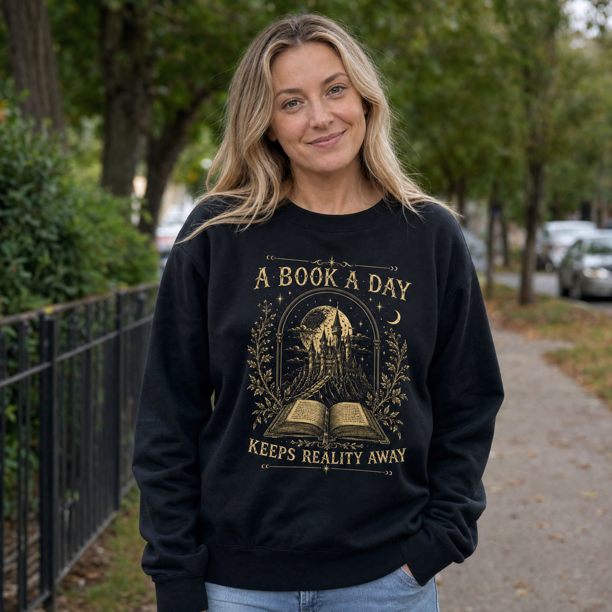 Model wearing the Fantasy Castle Book sweatshirt in Black, lifestyle image 1