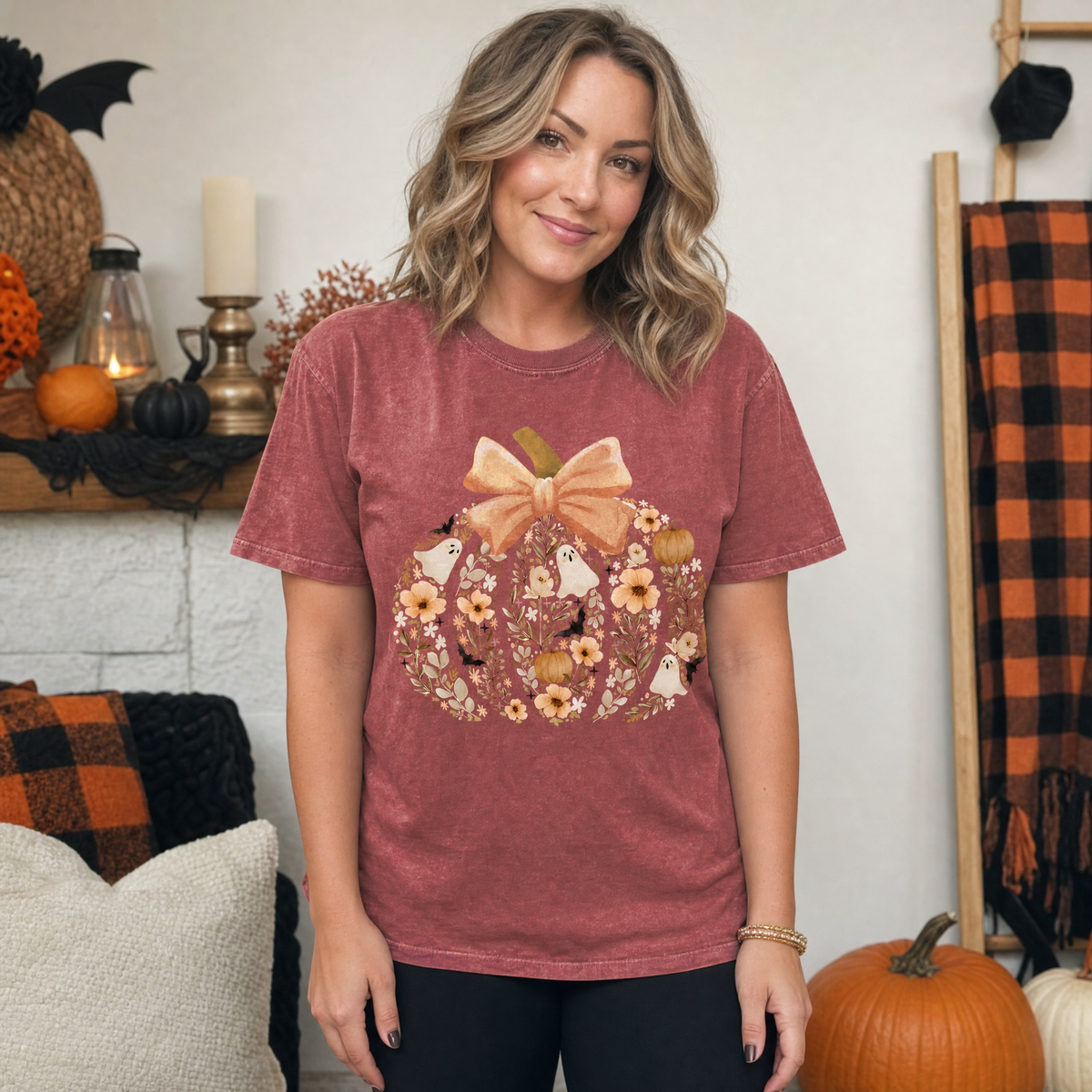 Model wearing the Floral Pumpkin comfort colors tee in Brick
