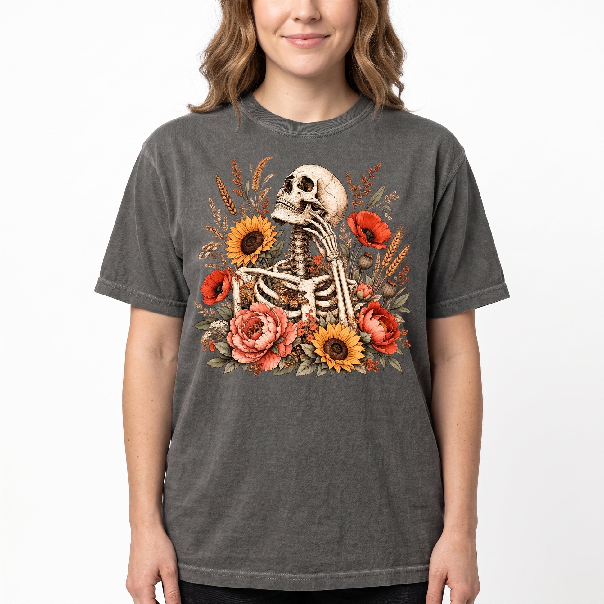 Model wearing the Floral Skeleton comfort colors tee in Pepper, cover image 1