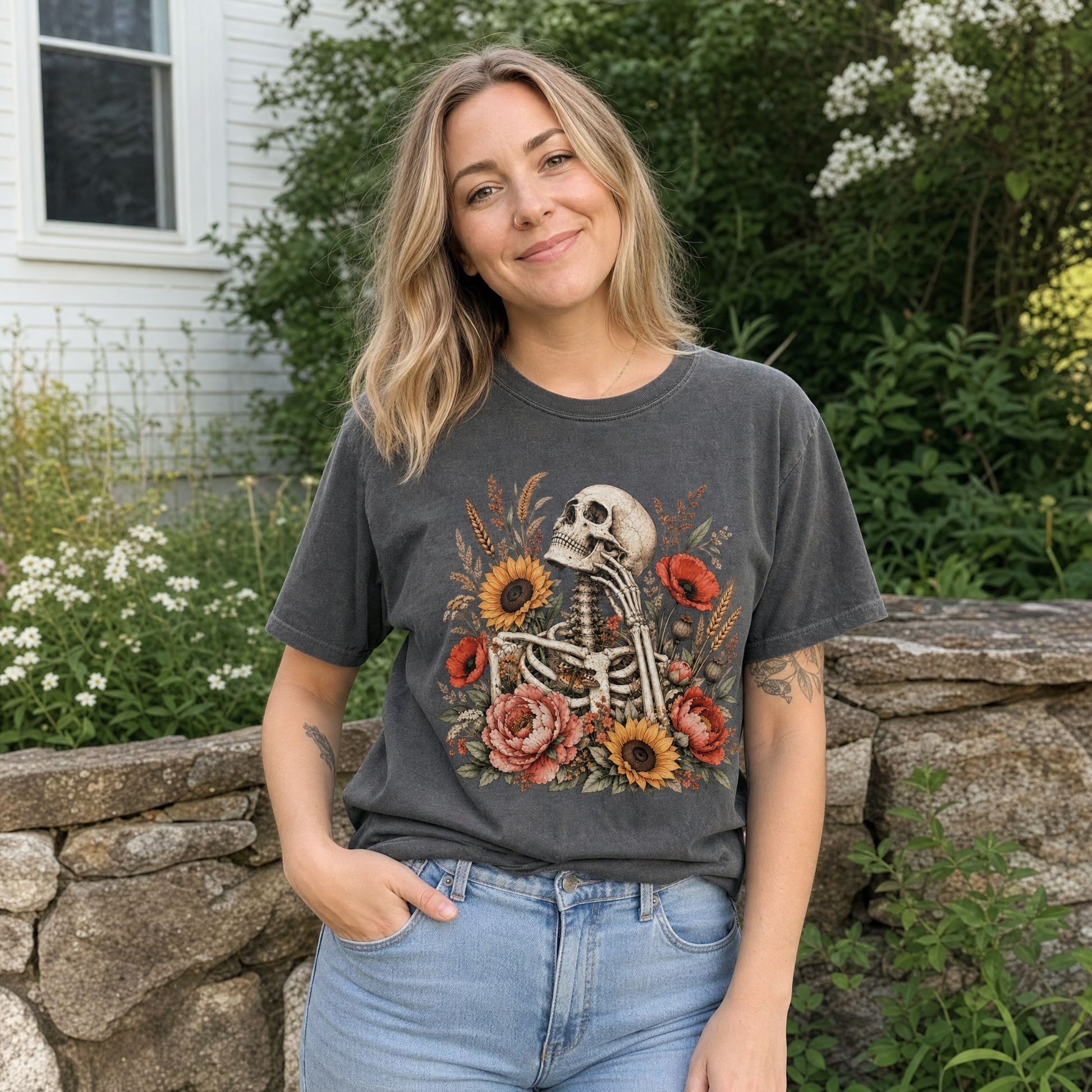 Model wearing the Floral Skeleton comfort colors tee in Pepper, lifestyle image 1