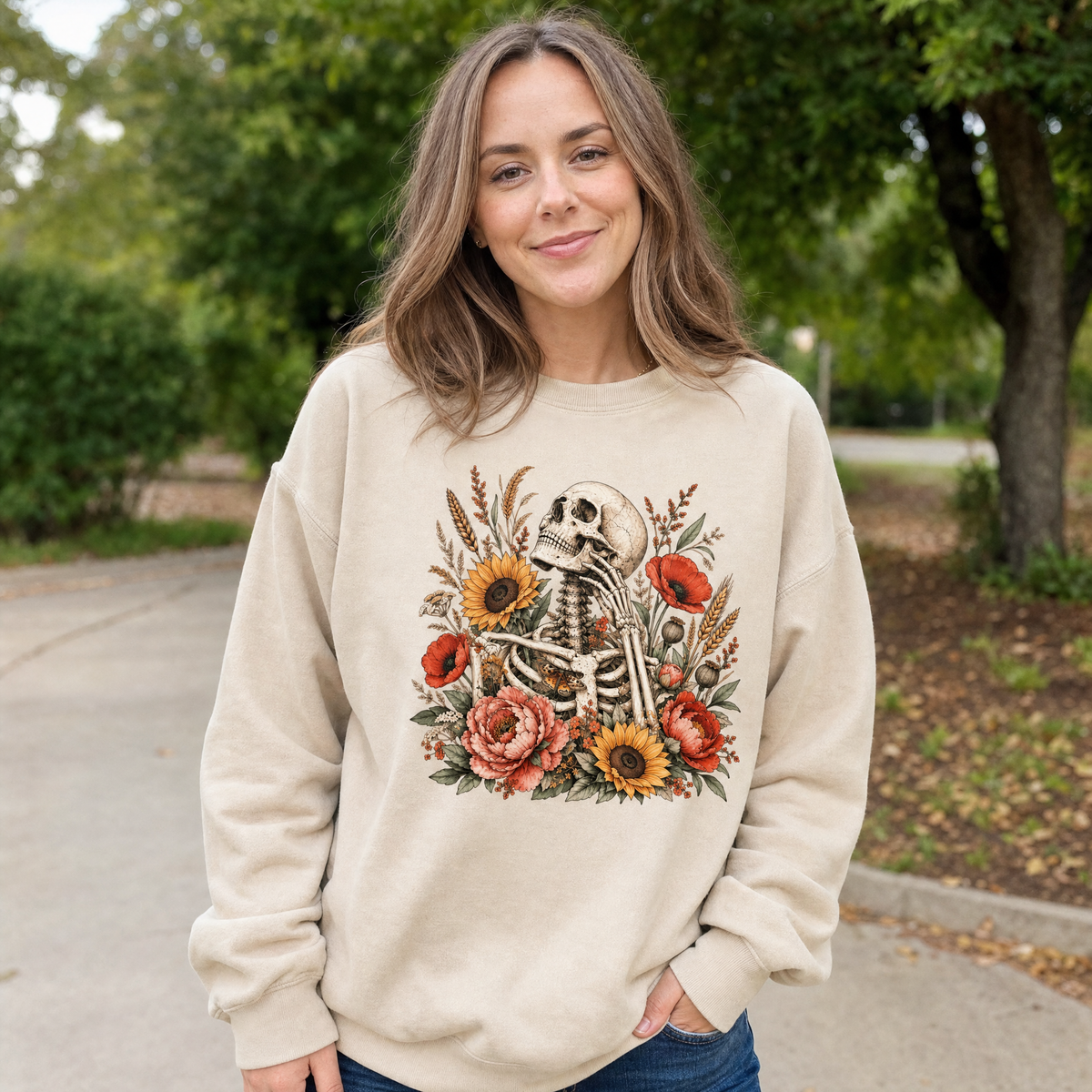 Model wearing the Floral Skeleton sweatshirt in Sand