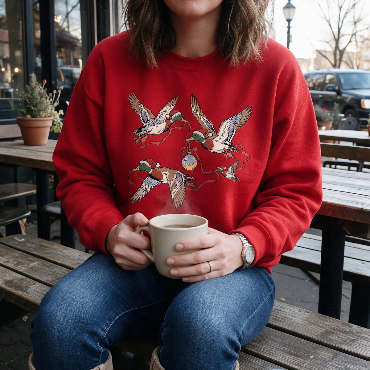 Model wearing the Flying Mallard Ducks sweatshirt in Red