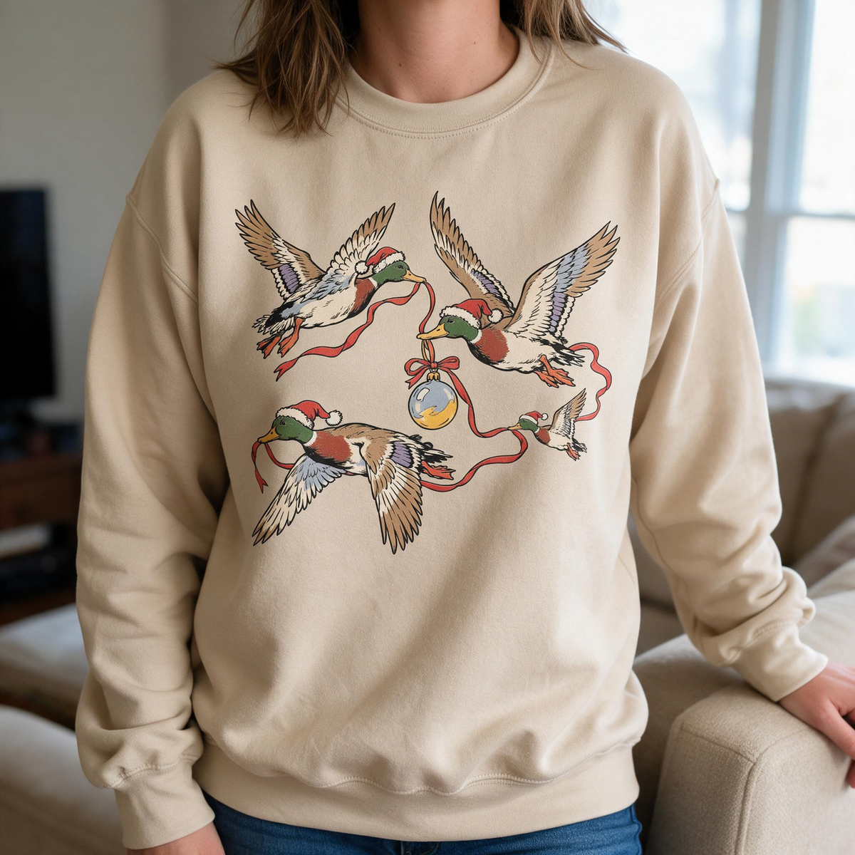 Model wearing the Flying Mallard Ducks sweatshirt in Sand, lifestyle image 1