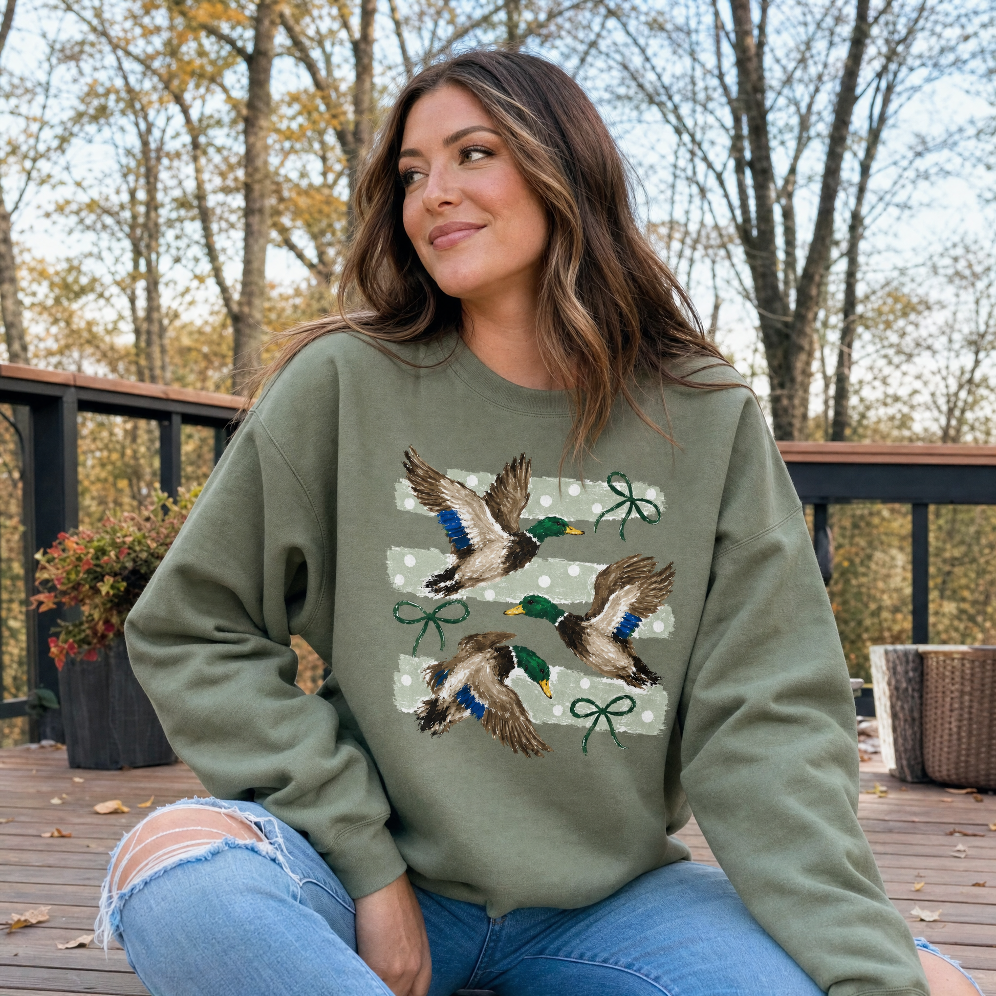 Model wearing the Flying Mallard Ducks sweatshirt in Military Green