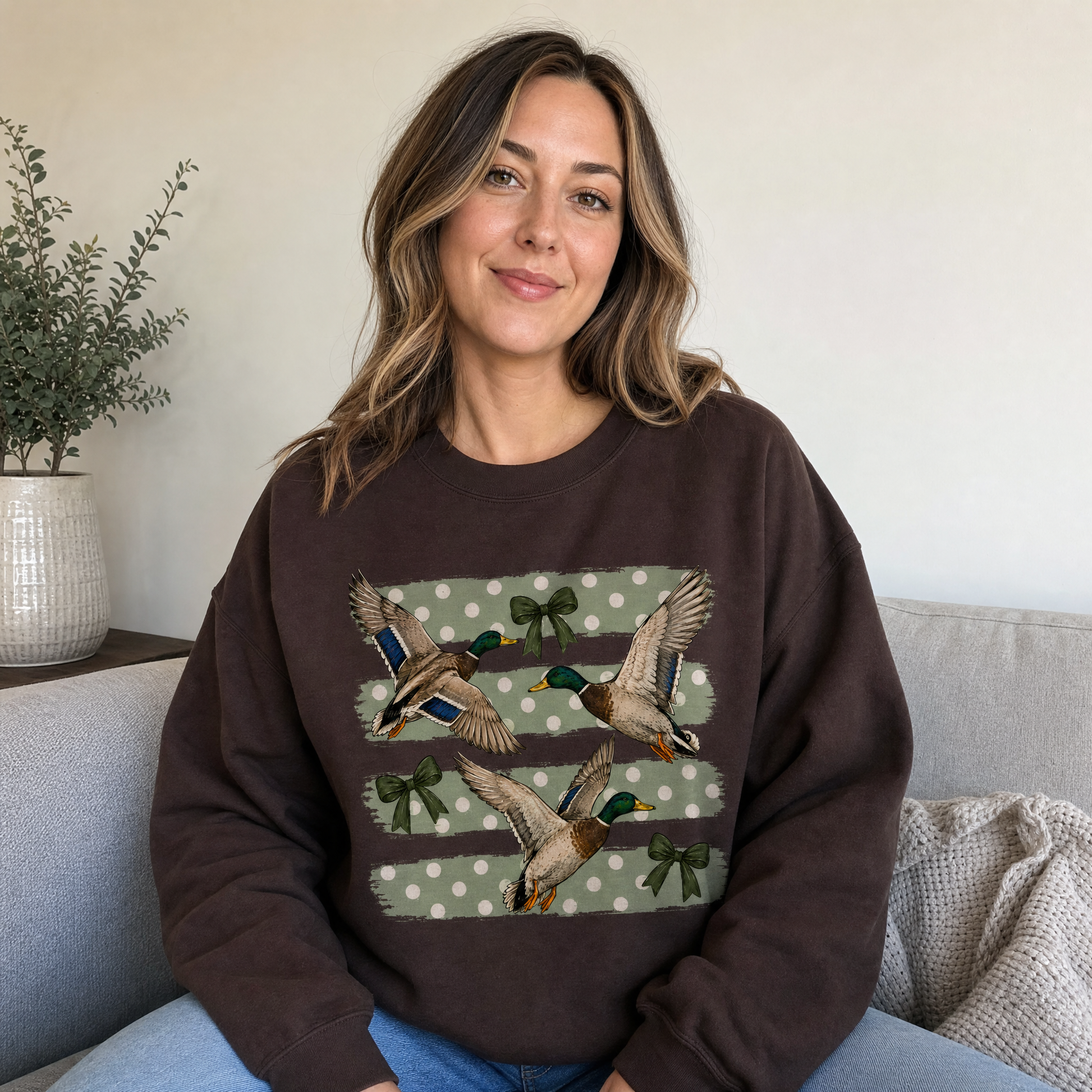 Model wearing the Flying Mallard Ducks sweatshirt in Dark Chocolate