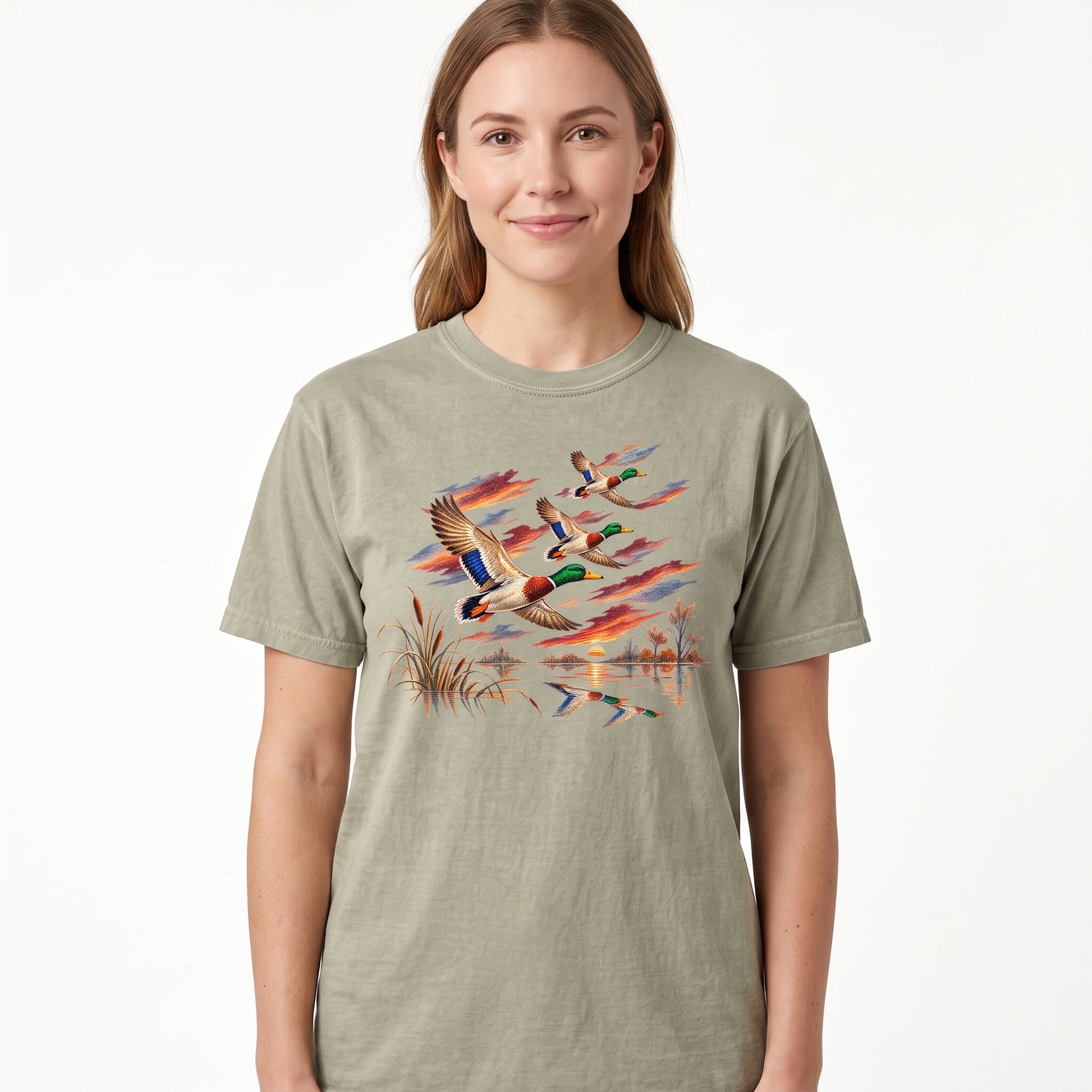 Model wearing the Flying Mallard Ducks comfort colors tee in Khaki, cover image 1