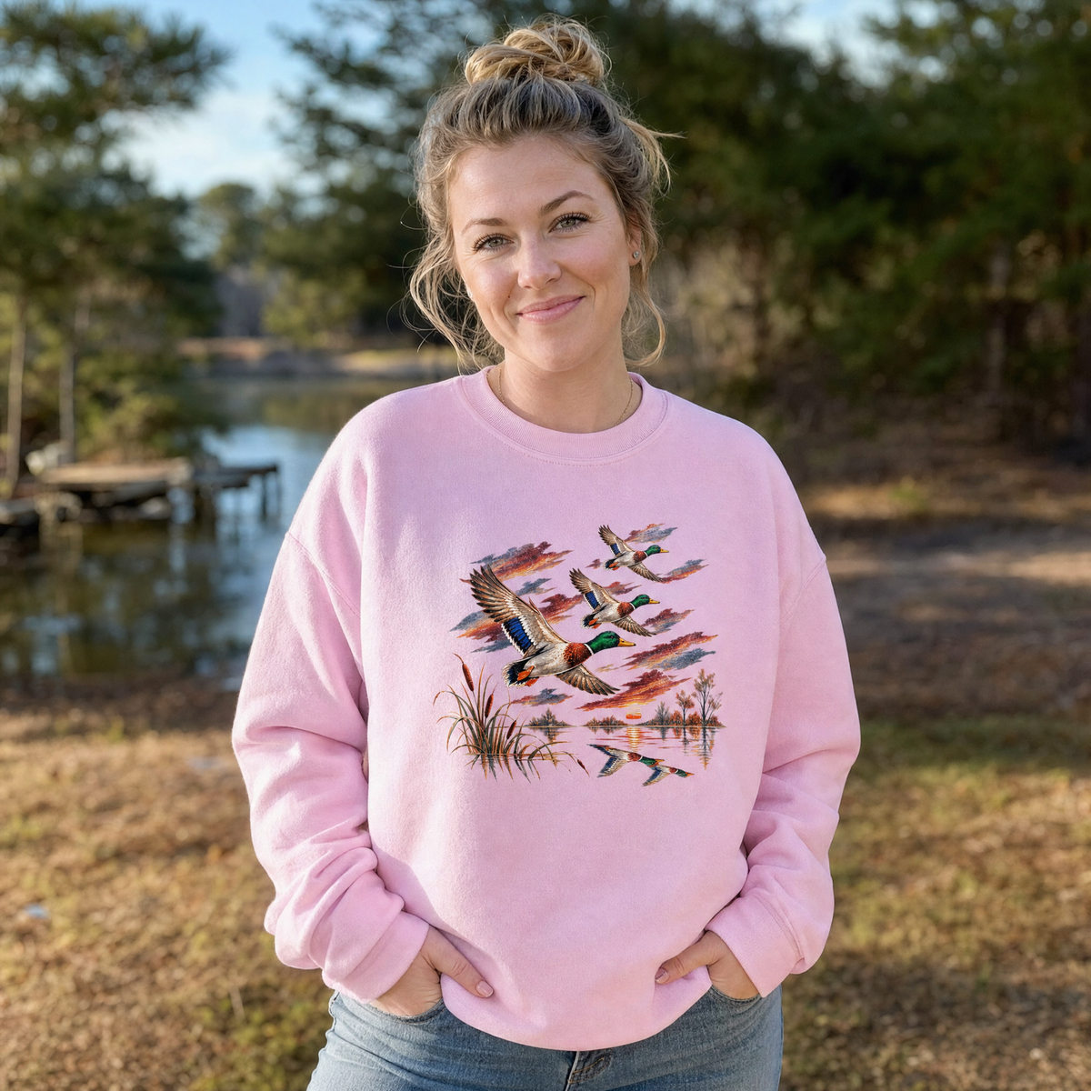 Model wearing the Flying Mallard Ducks sweatshirt in Light Pink