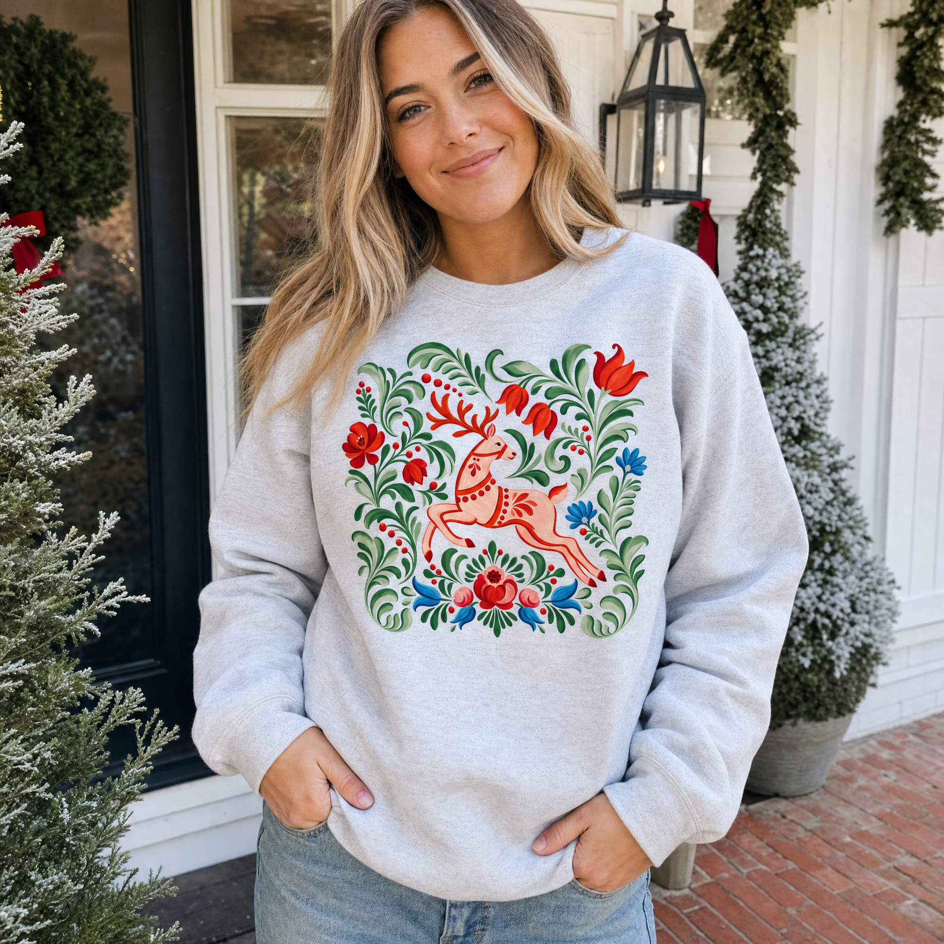 Model wearing the Folk Art Deer sweatshirt in Ash