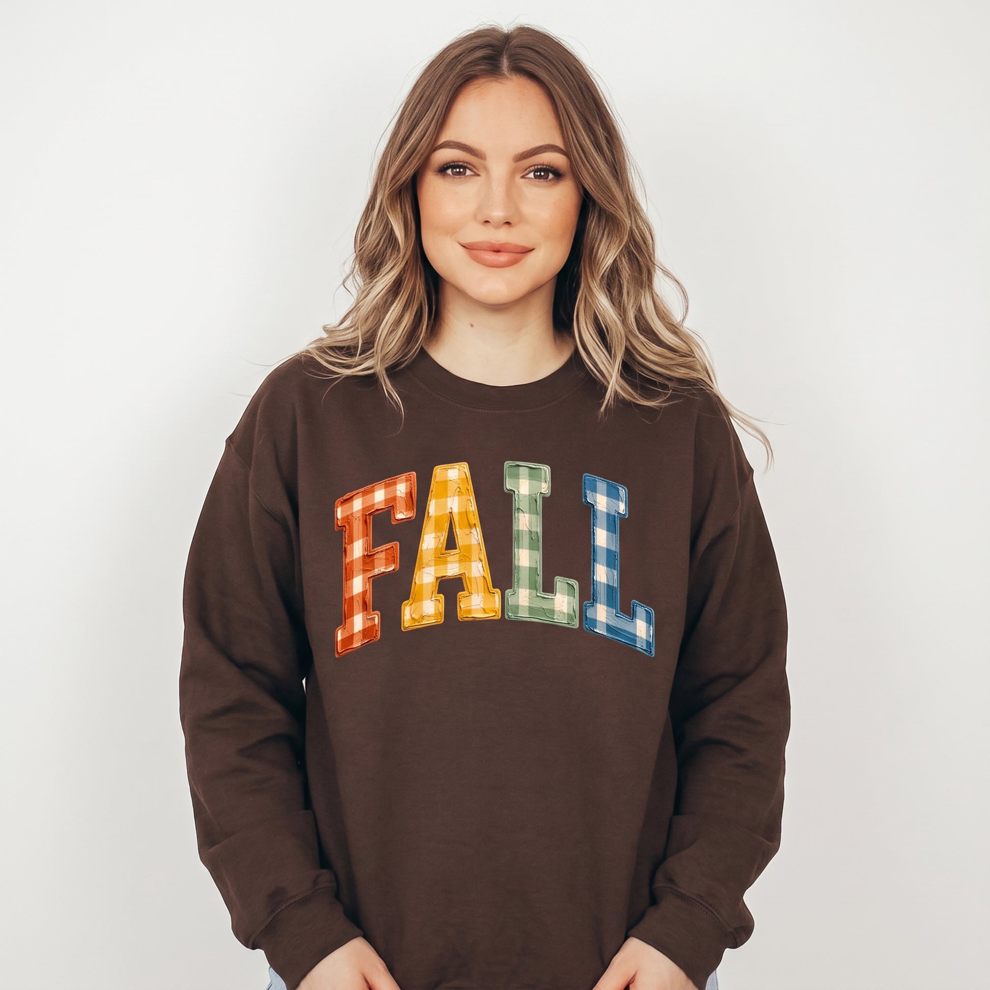 Model wearing the Gingham Fall Letters sweatshirt in Dark Chocolate
