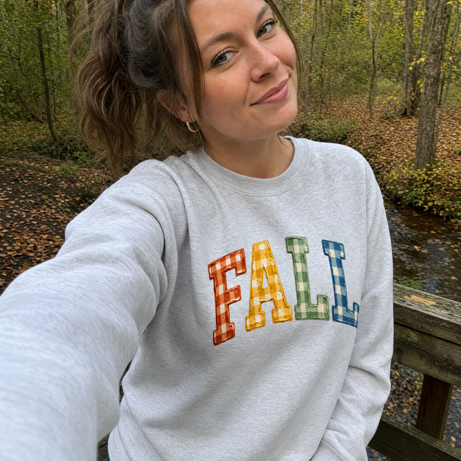 Model wearing the Gingham Fall Letters sweatshirt in Ash