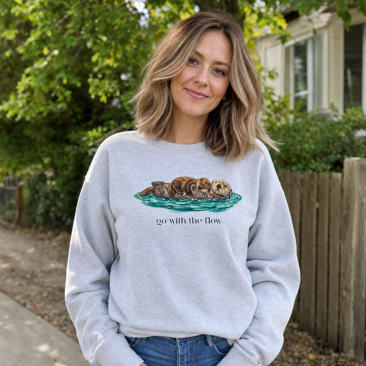 Model wearing the Go With The Flow sweatshirt in Ash