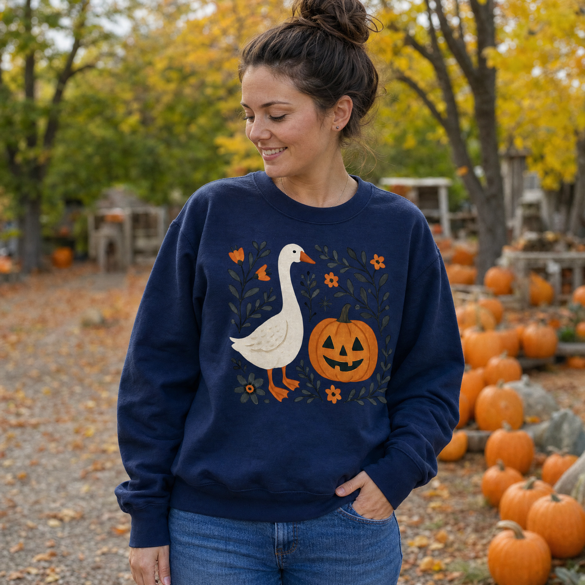 Model wearing the Goose Jack-o'-lantern sweatshirt in Navy