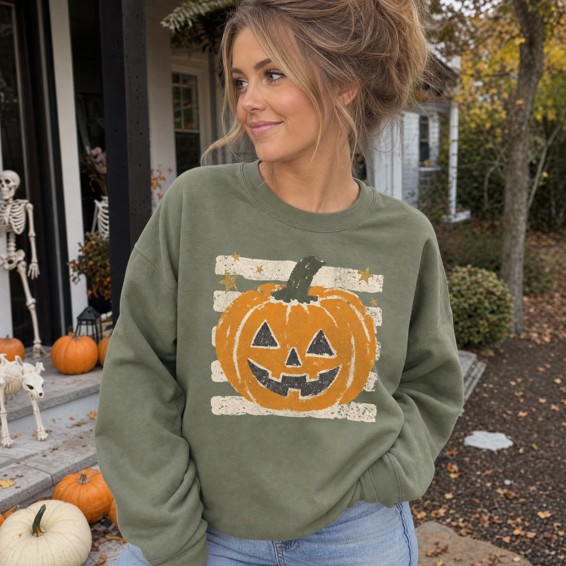 Model wearing the Grungy Jack-o'-lantern sweatshirt in Military Green