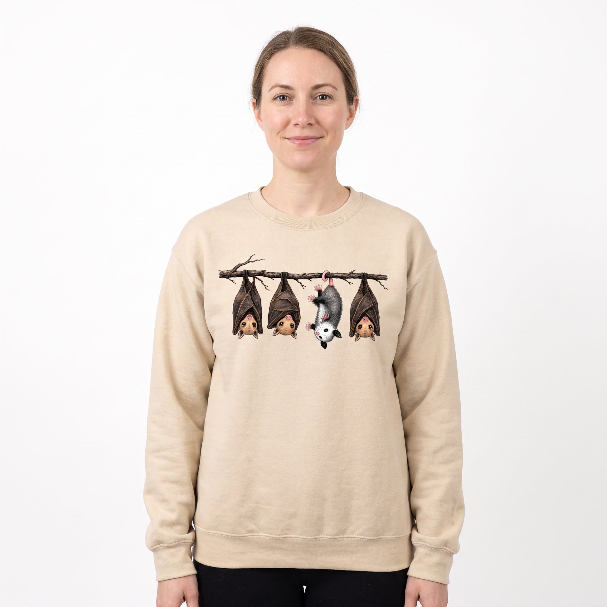 Model wearing the Hanging Bats sweatshirt in Sand, cover image 1