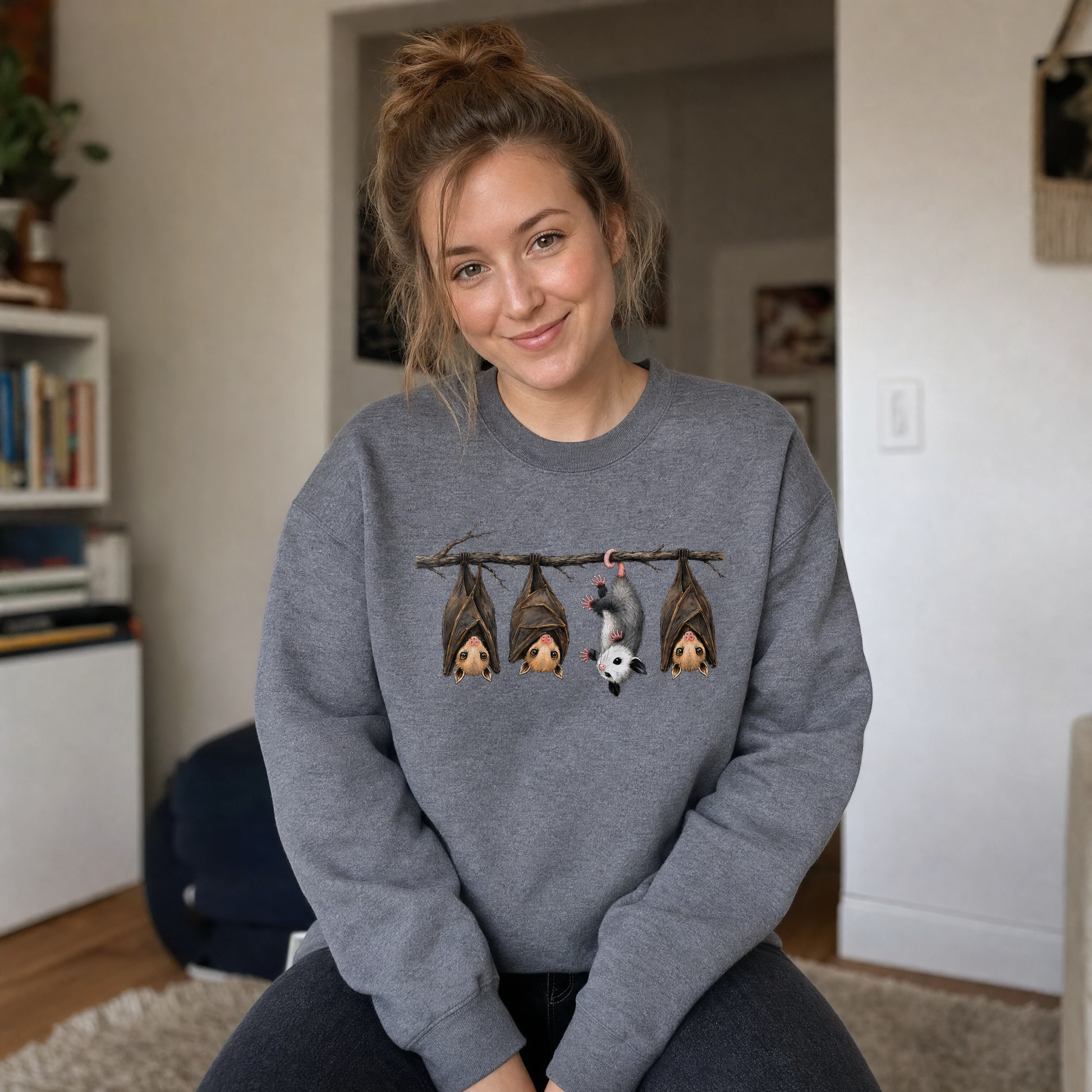 Model wearing the Hanging Bats sweatshirt in Dark Heather