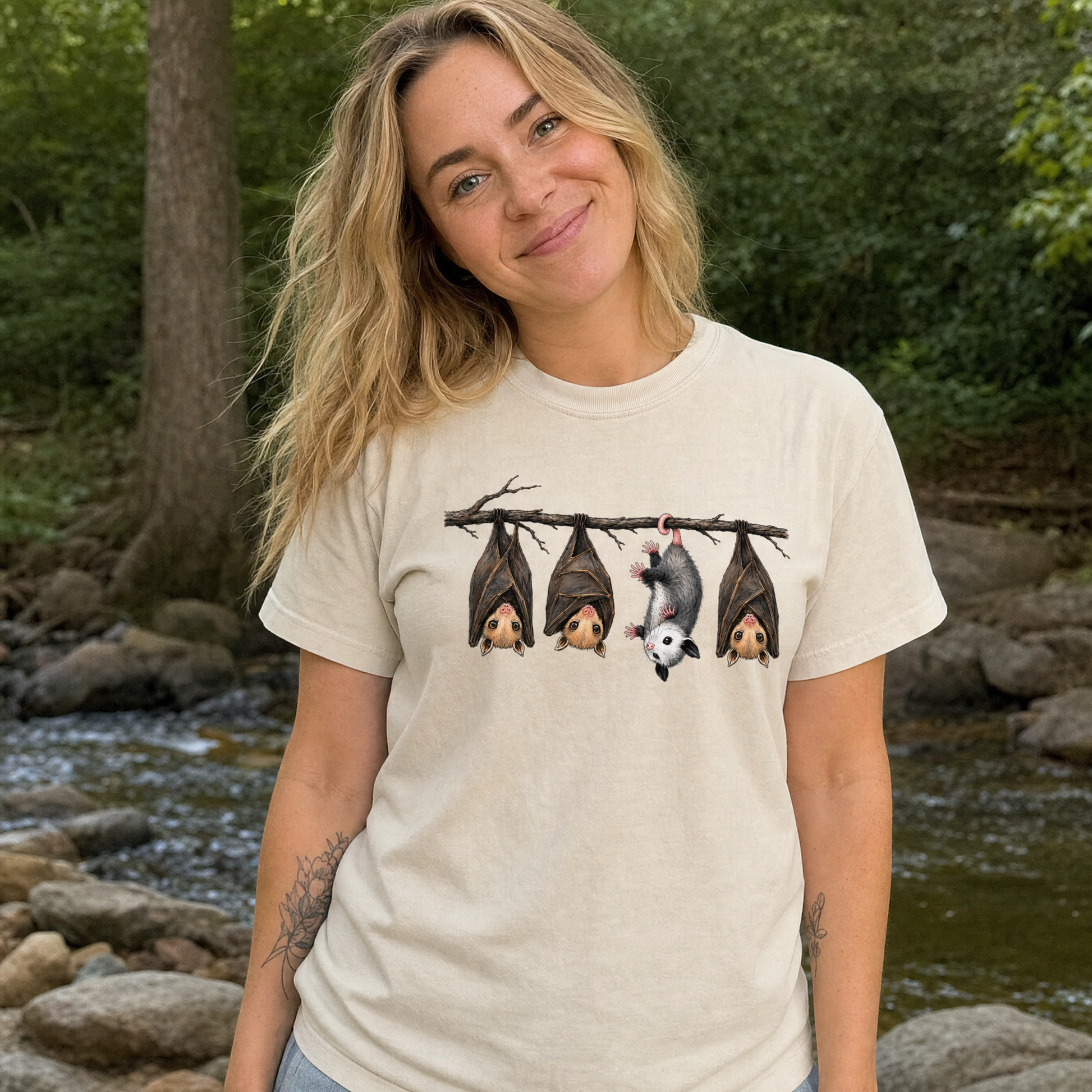 Model wearing the Hanging Bats comfort colors tee in Ivory
