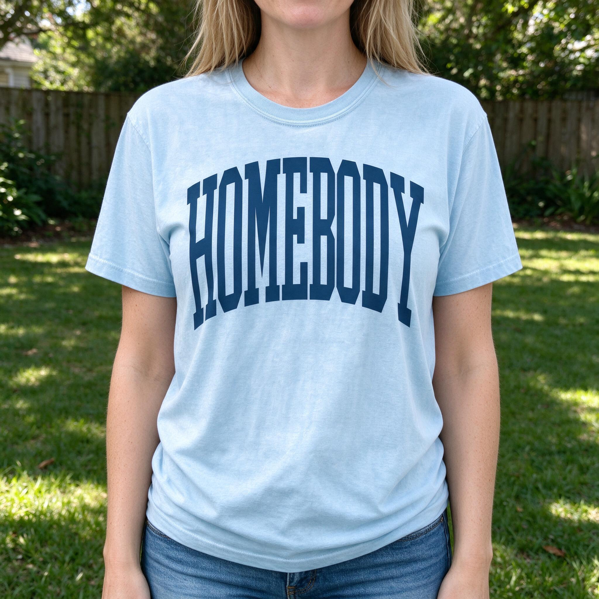 Model wearing the Homebody Text comfort colors tee in Chambray