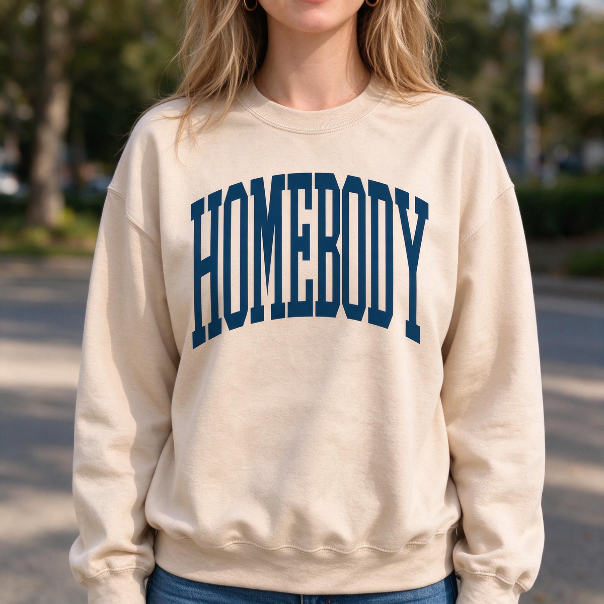 Model wearing the Homebody Text sweatshirt in Sand