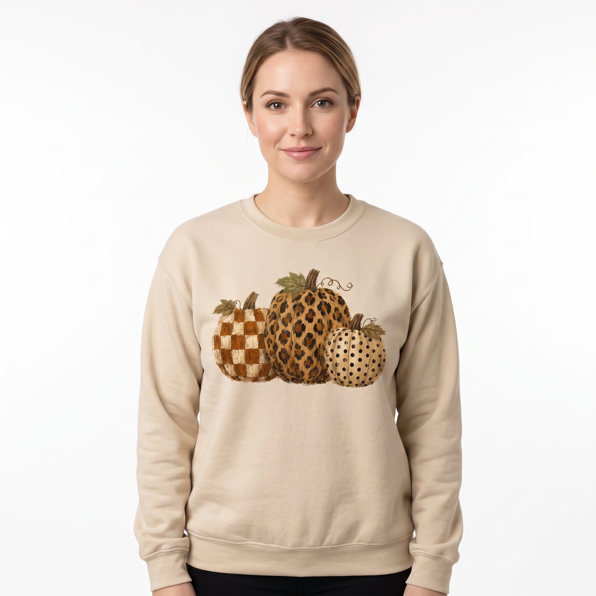 Model wearing the Leopard Polka Dot Pumpkins sweatshirt in Sand