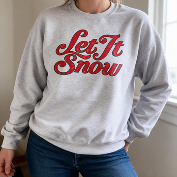 Model wearing the Let It Snow sweatshirt in Ash