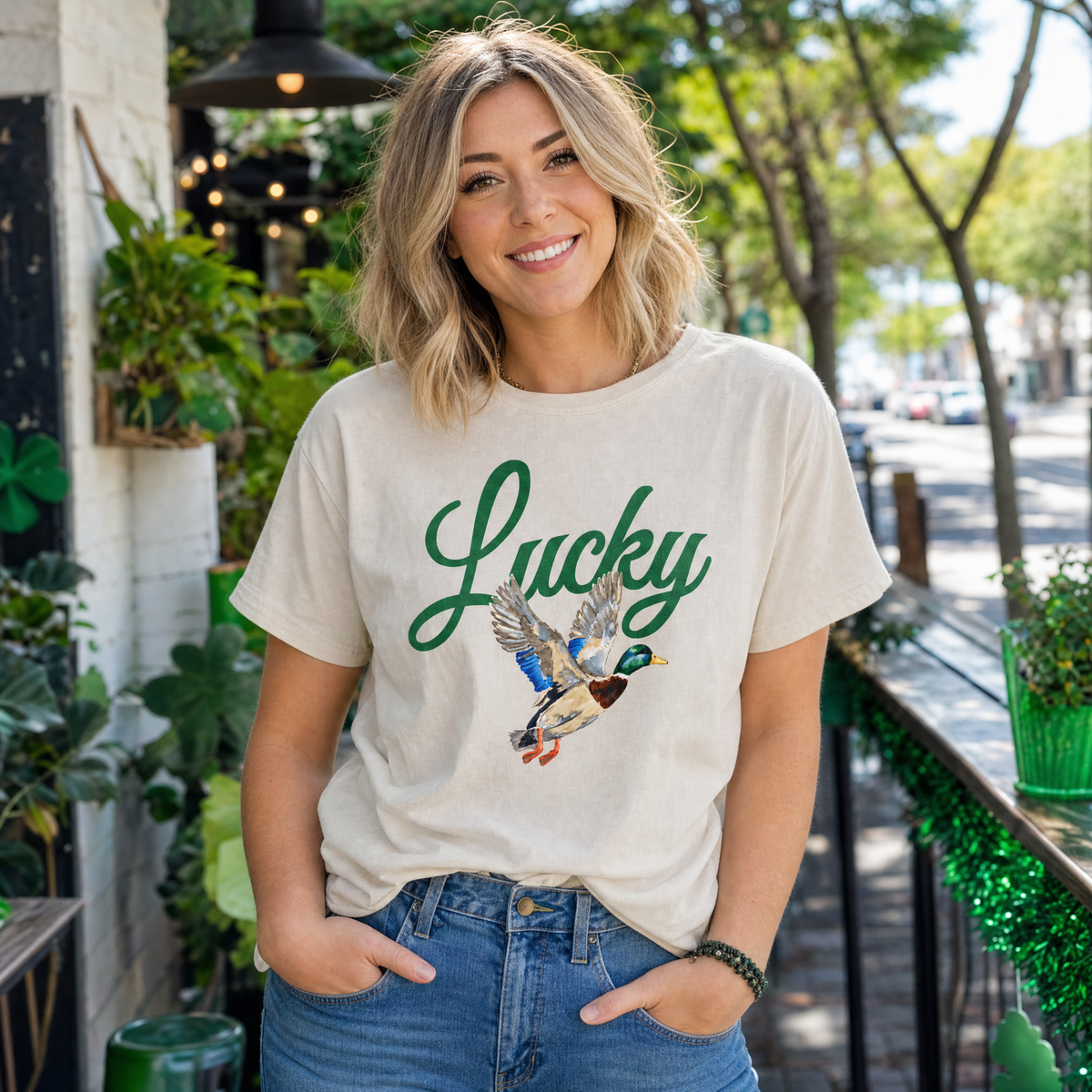 Model wearing the Lucky Mallard Duck comfort colors tee in Ivory, lifestyle image 1