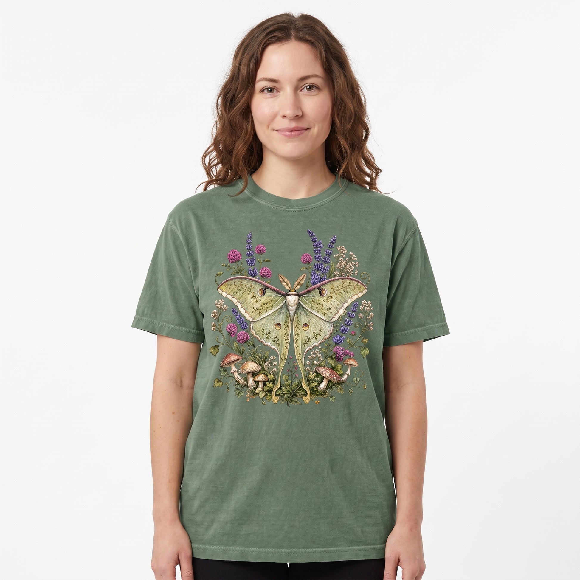 Model wearing the Luna Moth comfort colors tee in Moss, cover image 1