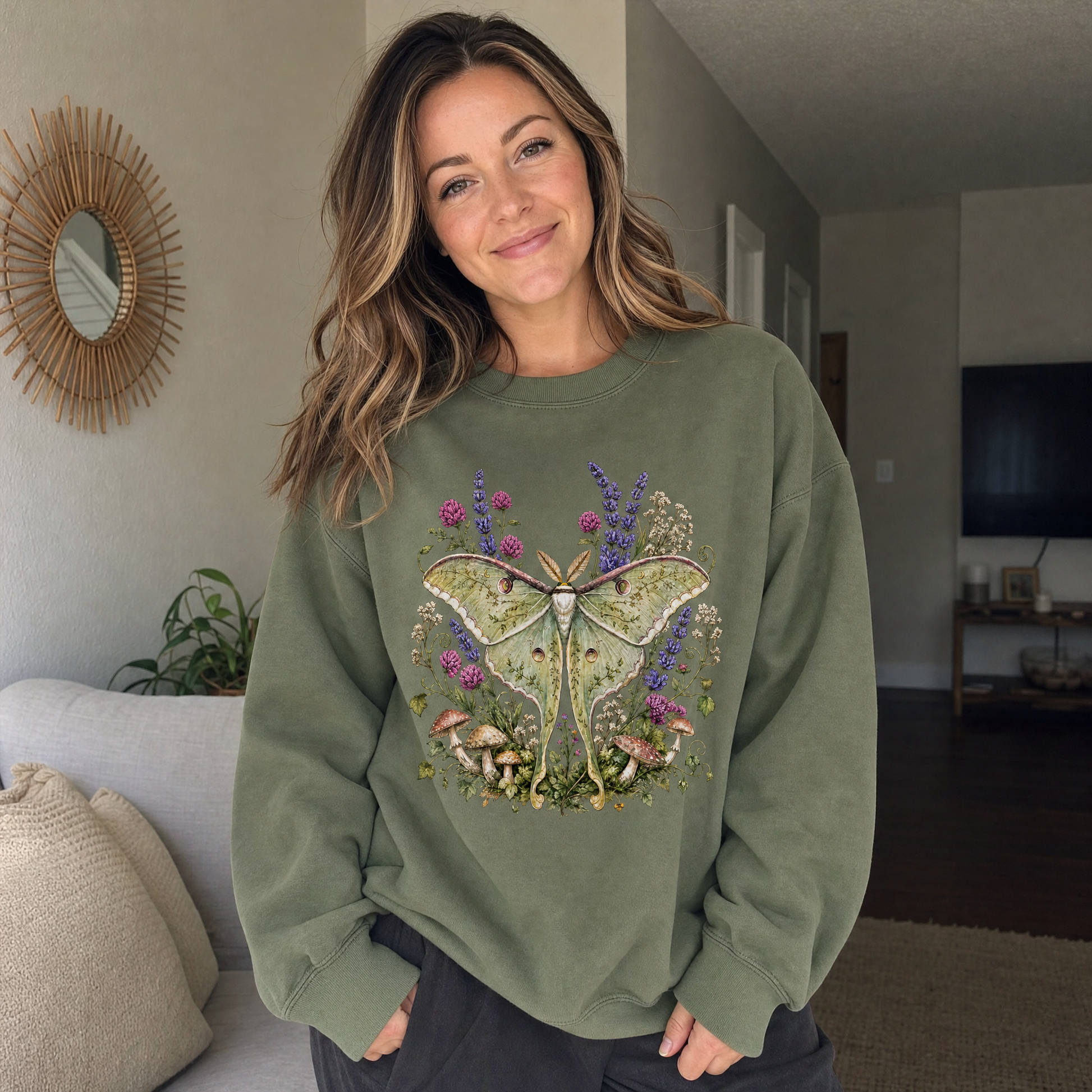 Model wearing the Luna Moth sweatshirt in Military Green