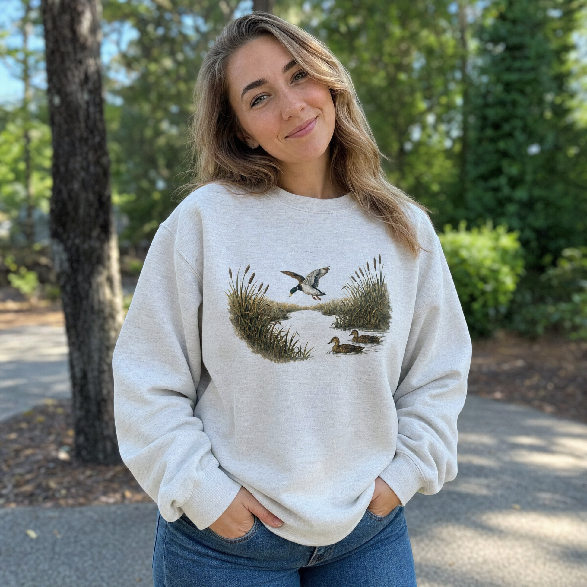 Model wearing the Mallard Ducks sweatshirt in Ash, lifestyle image 1