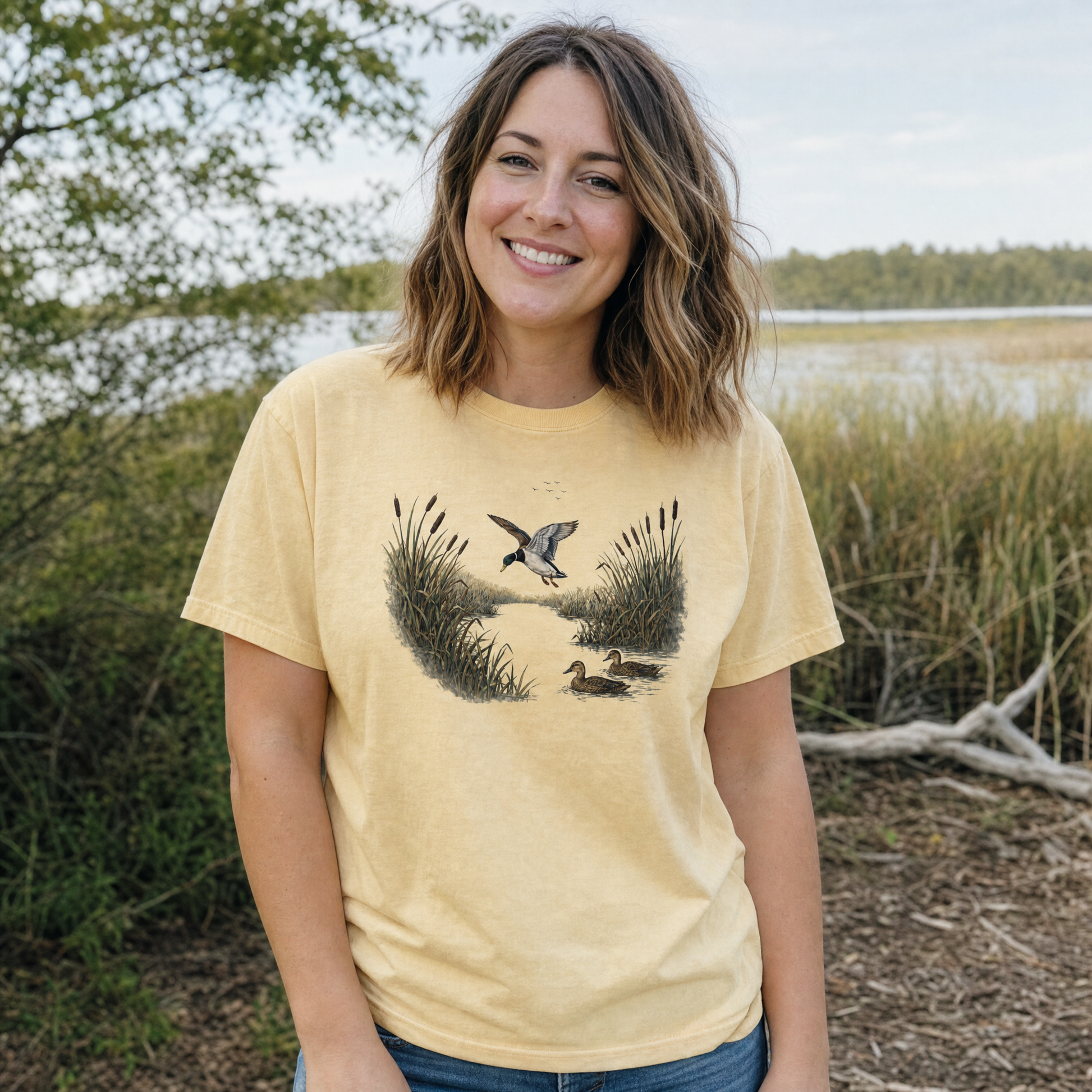 Model wearing the Mallard Ducks comfort colors tee in Butter
