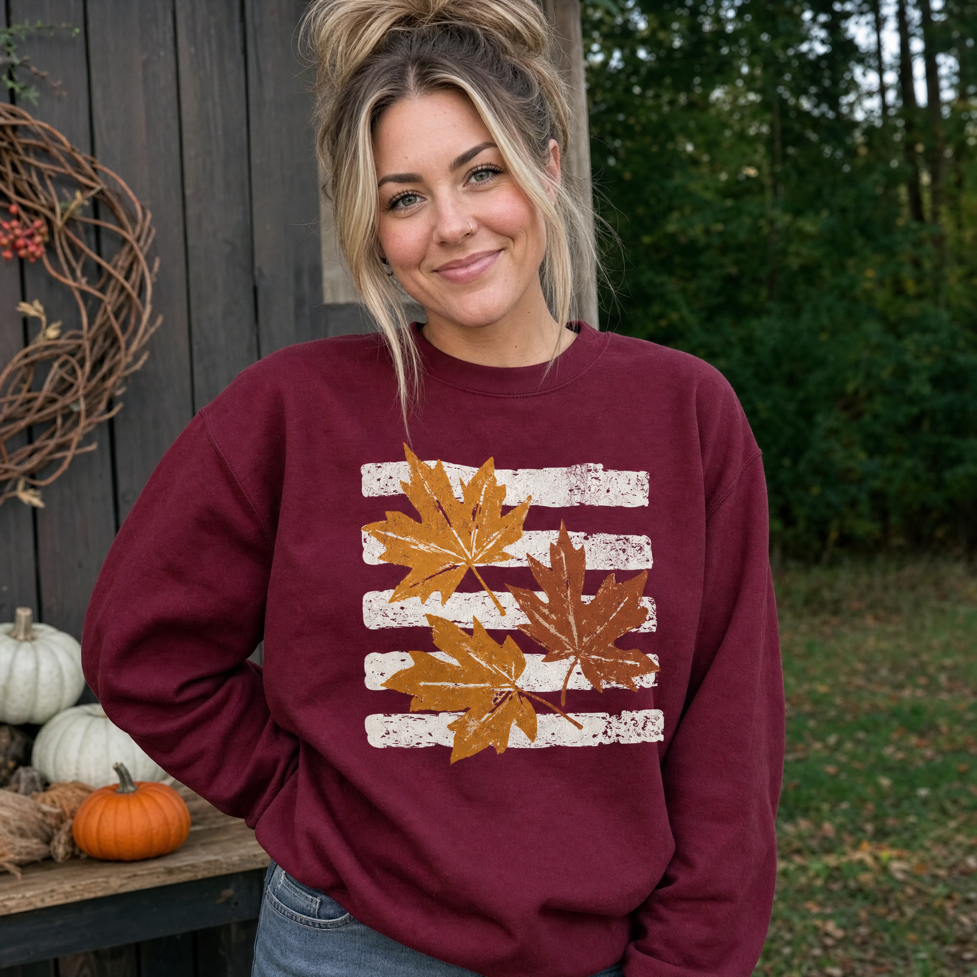 Model wearing the Maple Leaves sweatshirt in Maroon