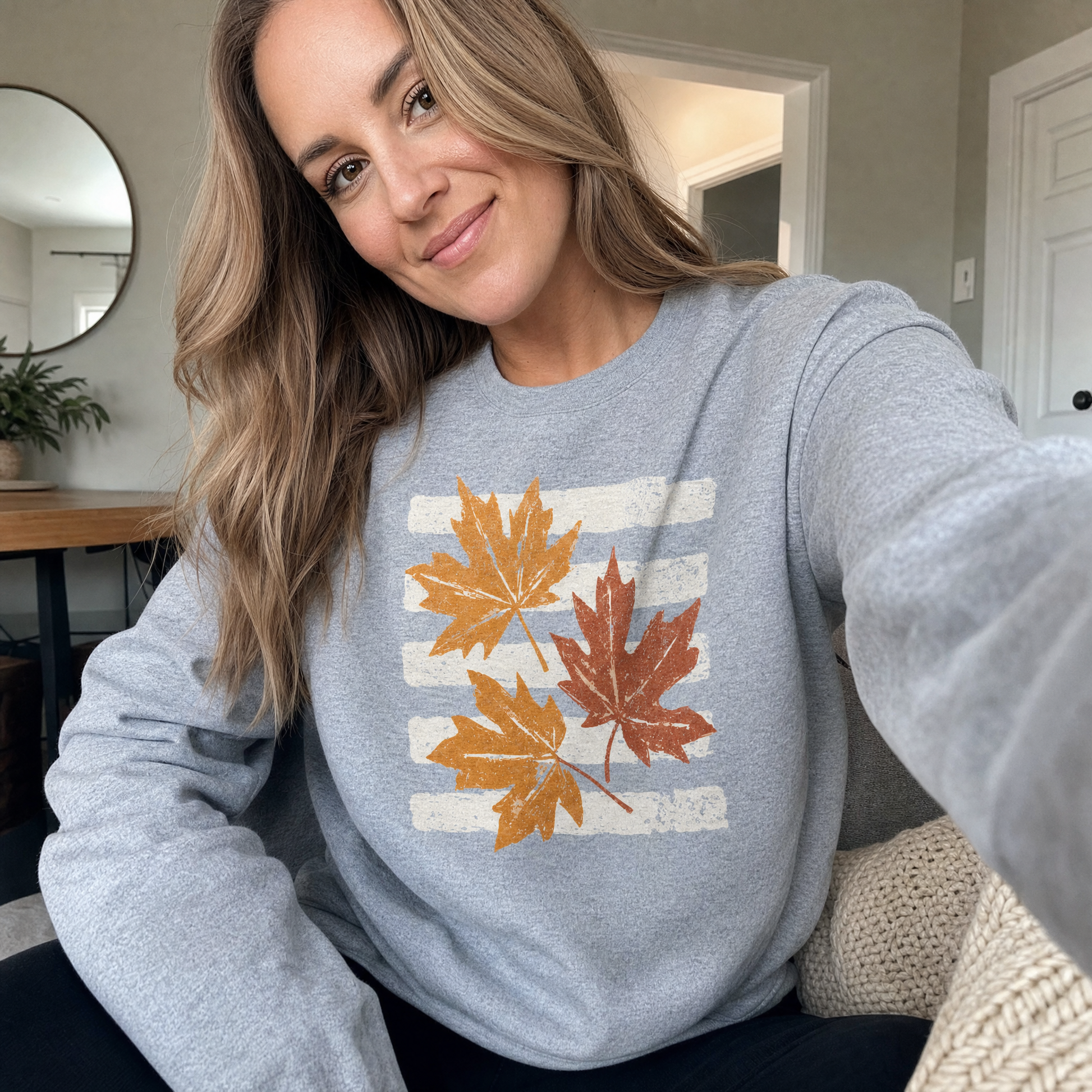 Model wearing the Maple Leaves sweatshirt in Sport Grey