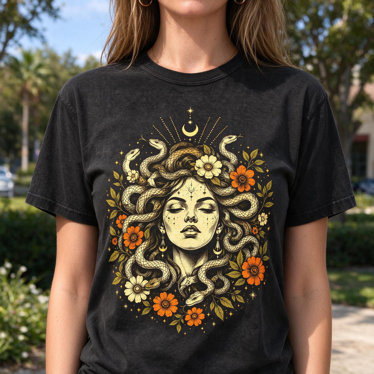 Model wearing the Medusa Goddess comfort colors tee in Black