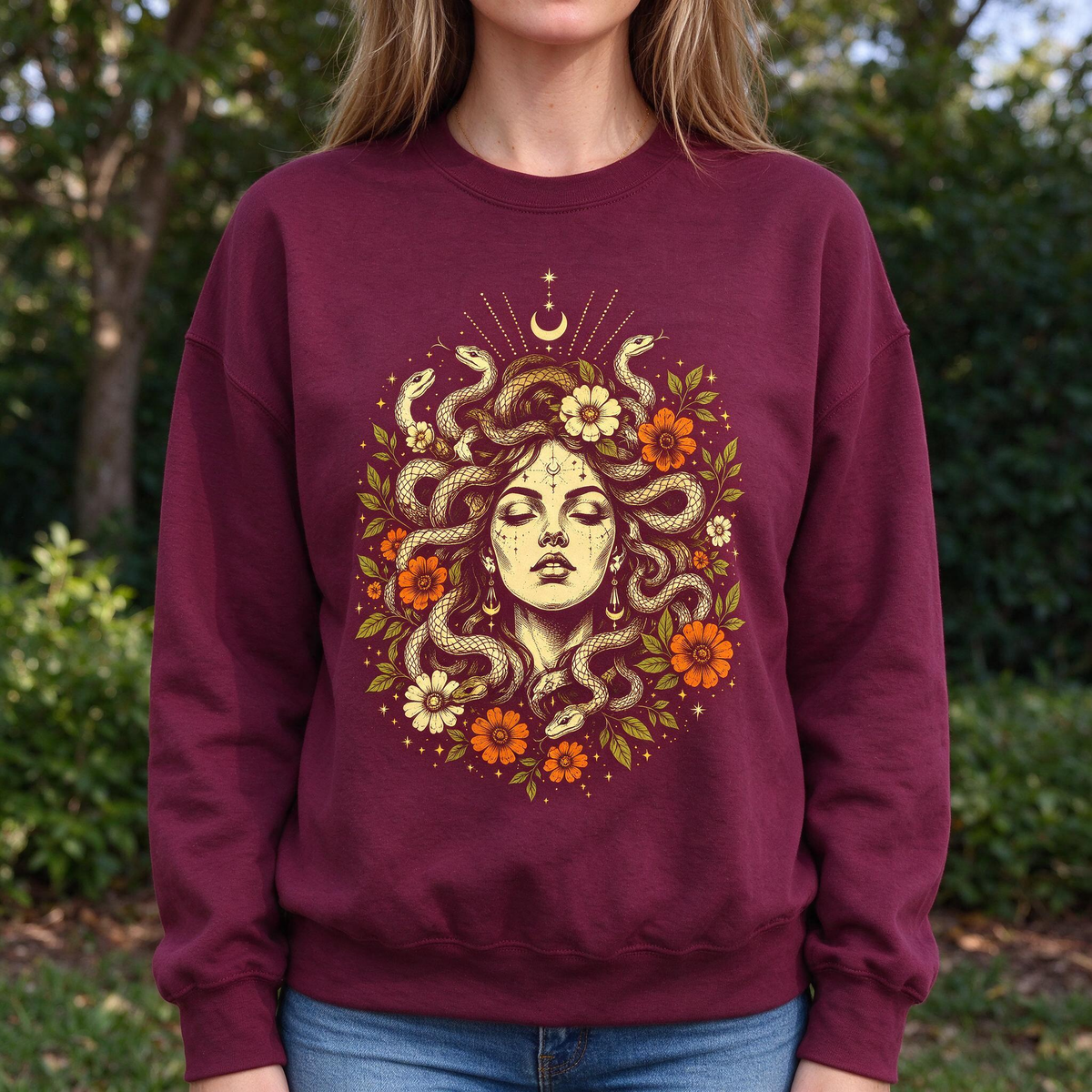 Model wearing the Medusa Goddess sweatshirt in Maroon