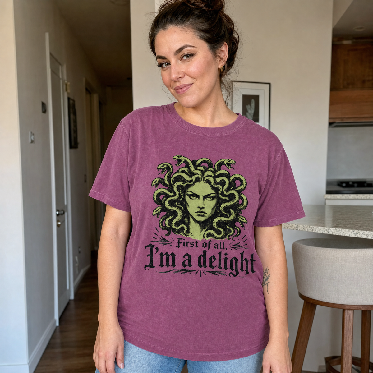Model wearing the Medusa comfort colors tee in Berry