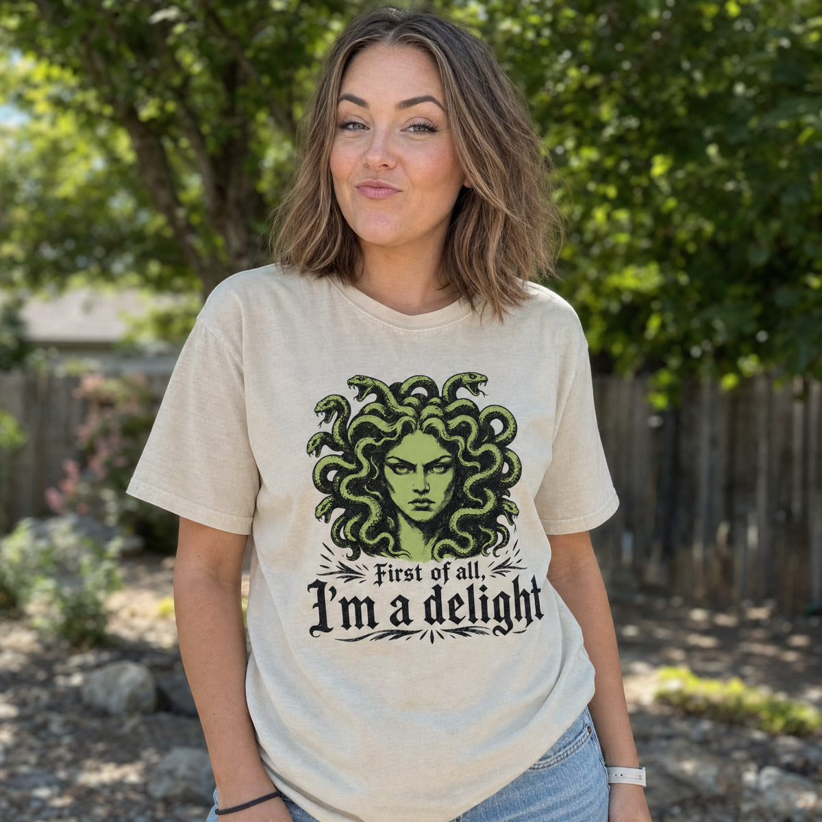 Model wearing the Medusa comfort colors tee in Ivory