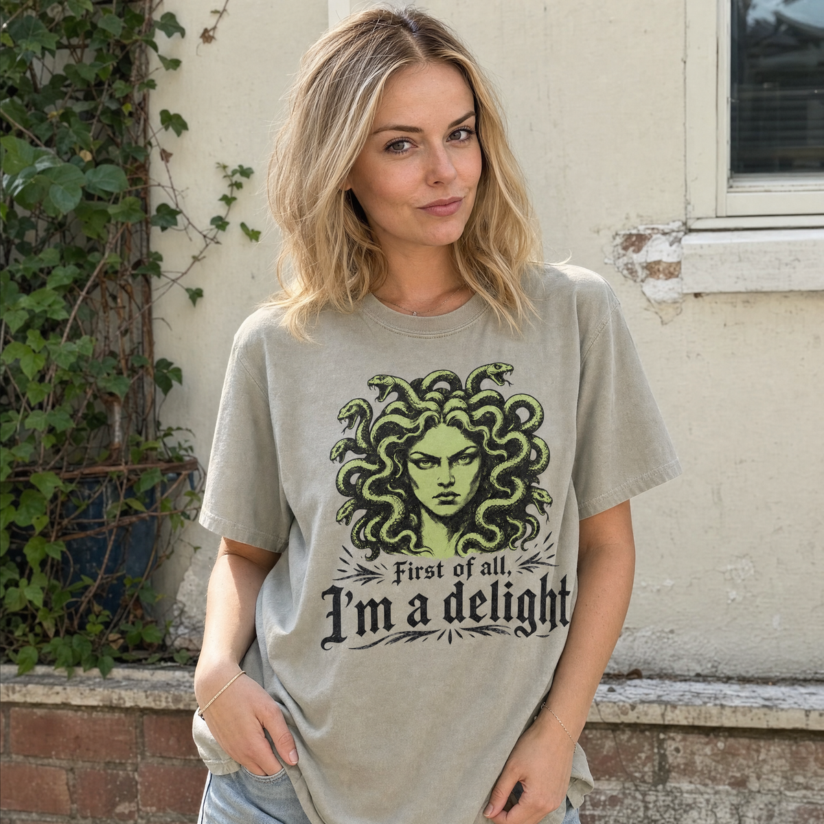 Model wearing the Medusa comfort colors tee in Khaki, lifestyle image 1