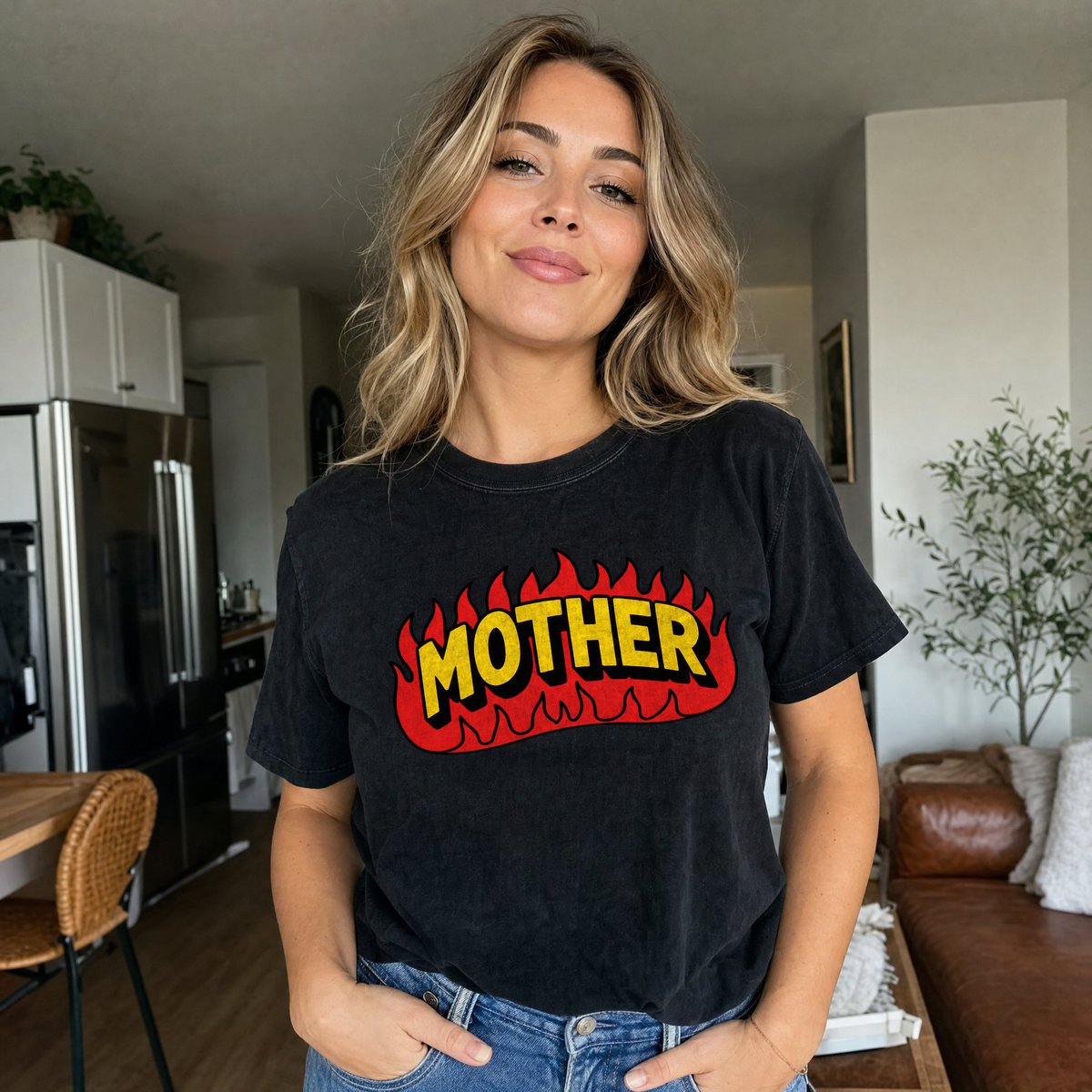 Model wearing the Mother Flaming Text comfort colors tee in Black