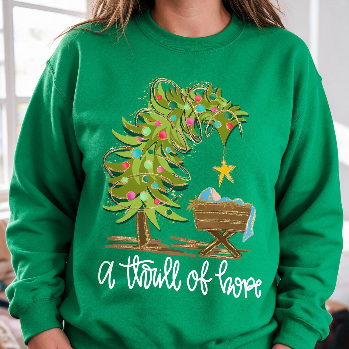 Model wearing the Nativity Scene sweatshirt in Irish Green
