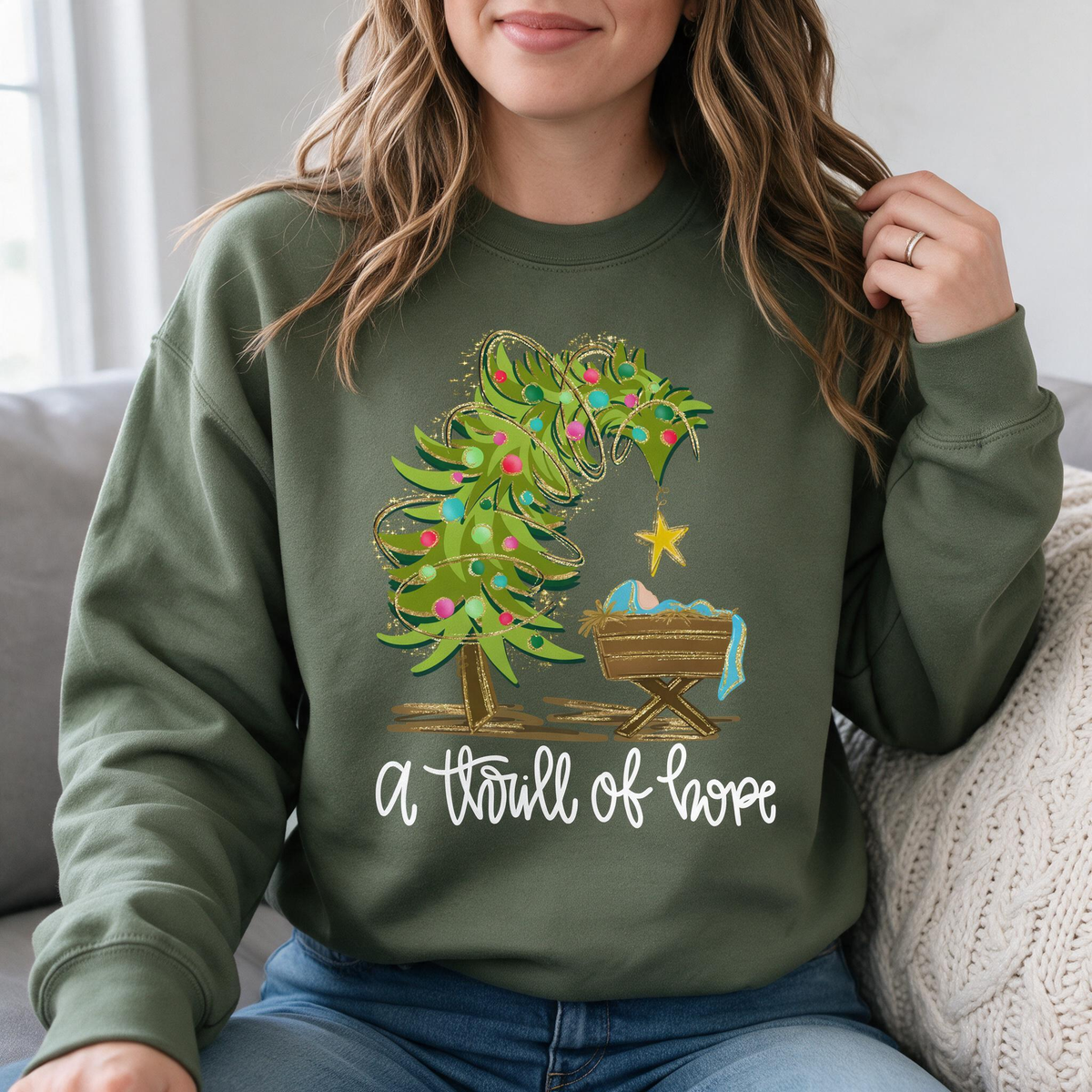 Model wearing the Nativity Scene sweatshirt in Military Green