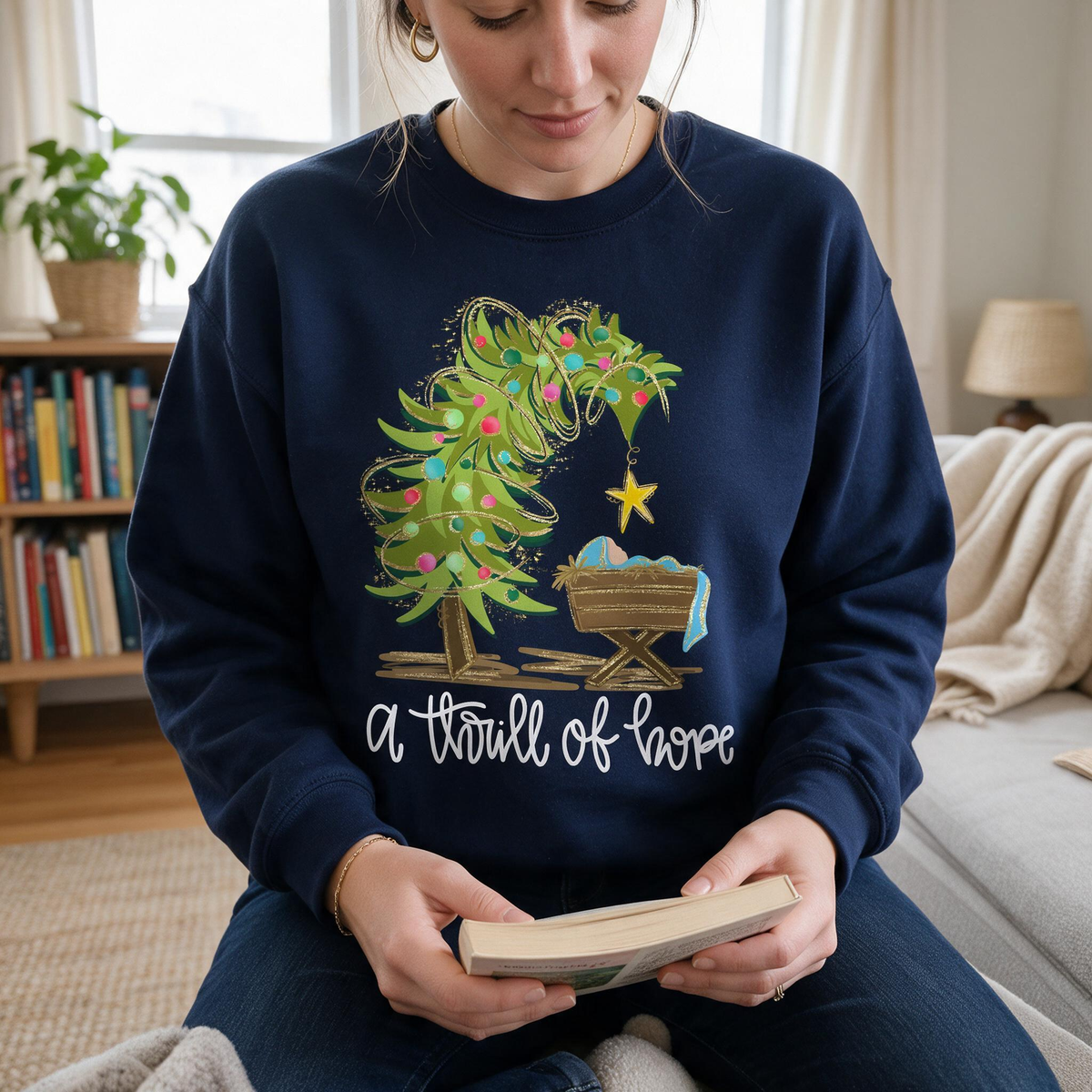 Model wearing the Nativity Scene sweatshirt in Navy