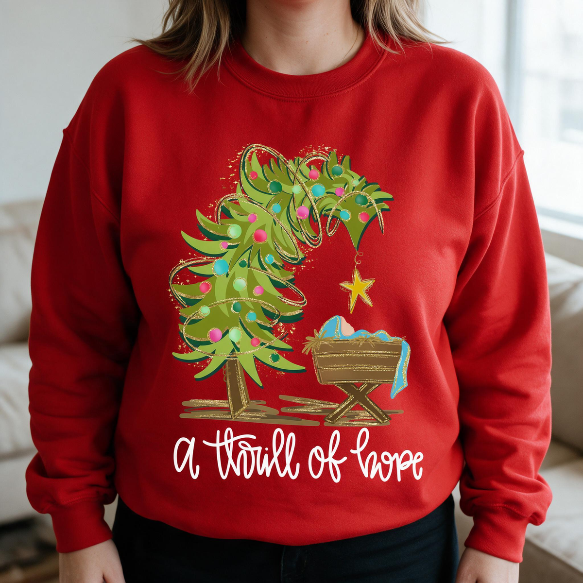 Model wearing the Nativity Scene sweatshirt in Red