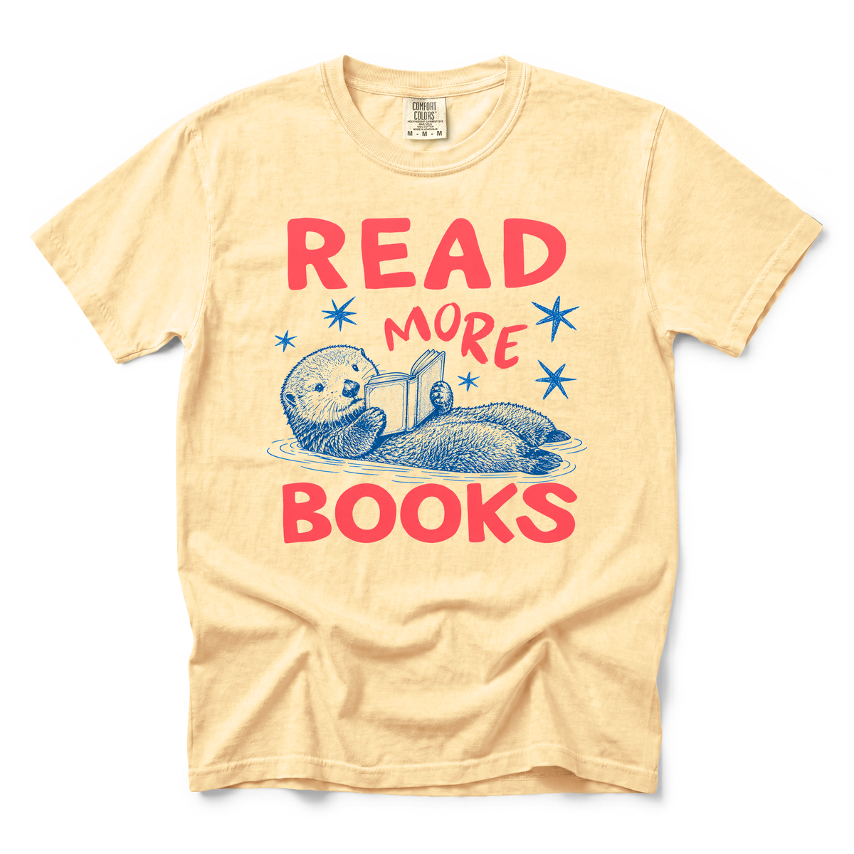 Otter Reading Book graphic on Comfort Colors 1717 in Butter